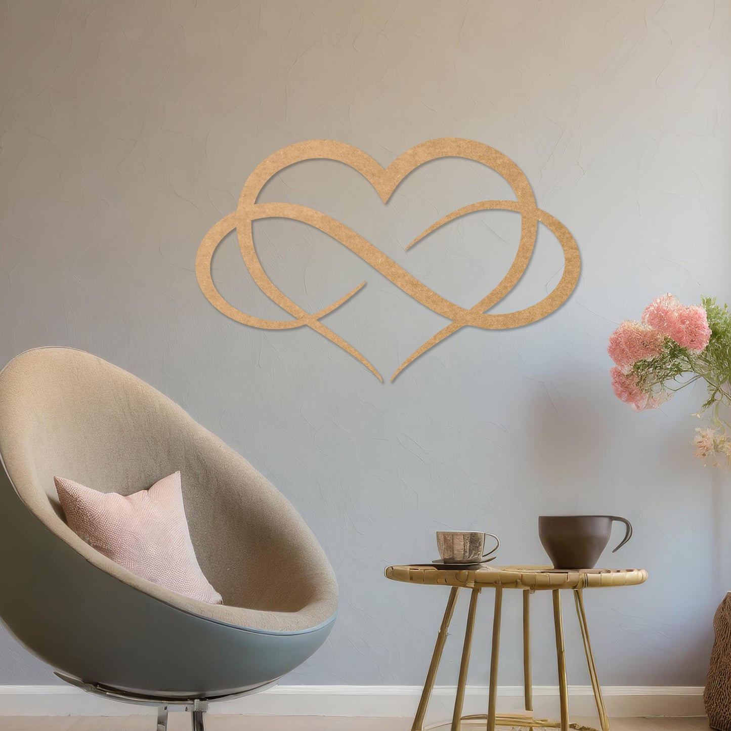Wooden infinity heart wall art featuring a minimalist and elegant design, blending an infinity symbol seamlessly into a heart shape, displayed on a neutral wall within modern decor to add a timeless touch to the space.