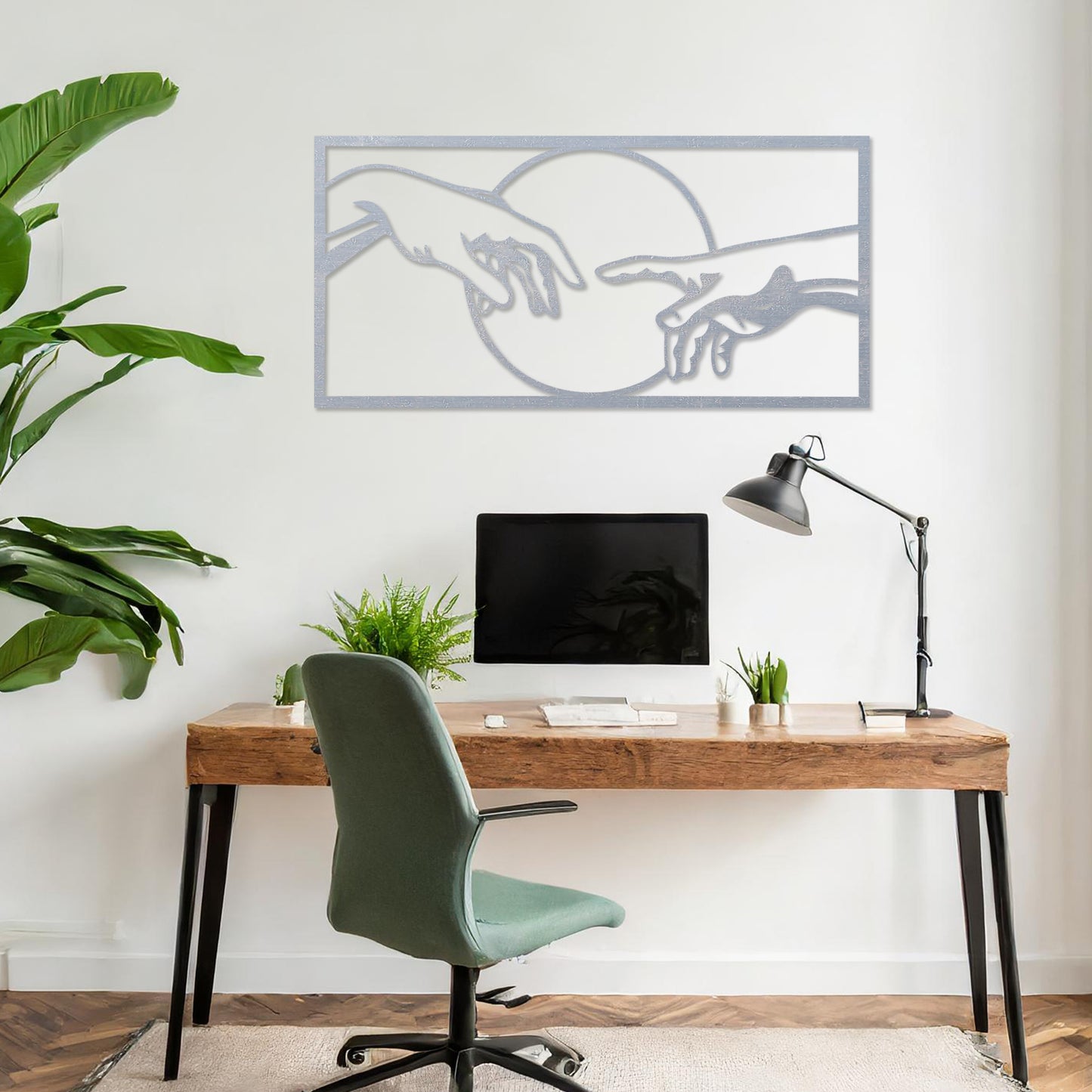 Wooden wall art featuring a minimalist depiction of two hands reaching out towards each other, framed by a circular design. Mounted on a neutral wall within modern room decor, this piece adds an artistic and meaningful touch to any space.