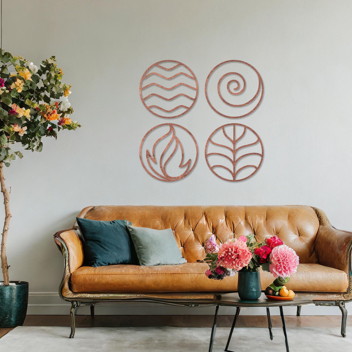 Wooden wall art set featuring four circular designs symbolising natural elements: waves for water, a spiral for air, flames for fire, and leaves for earth. Mounted on a neutral wall within modern decor, these minimalist designs evoke balance and harmony.