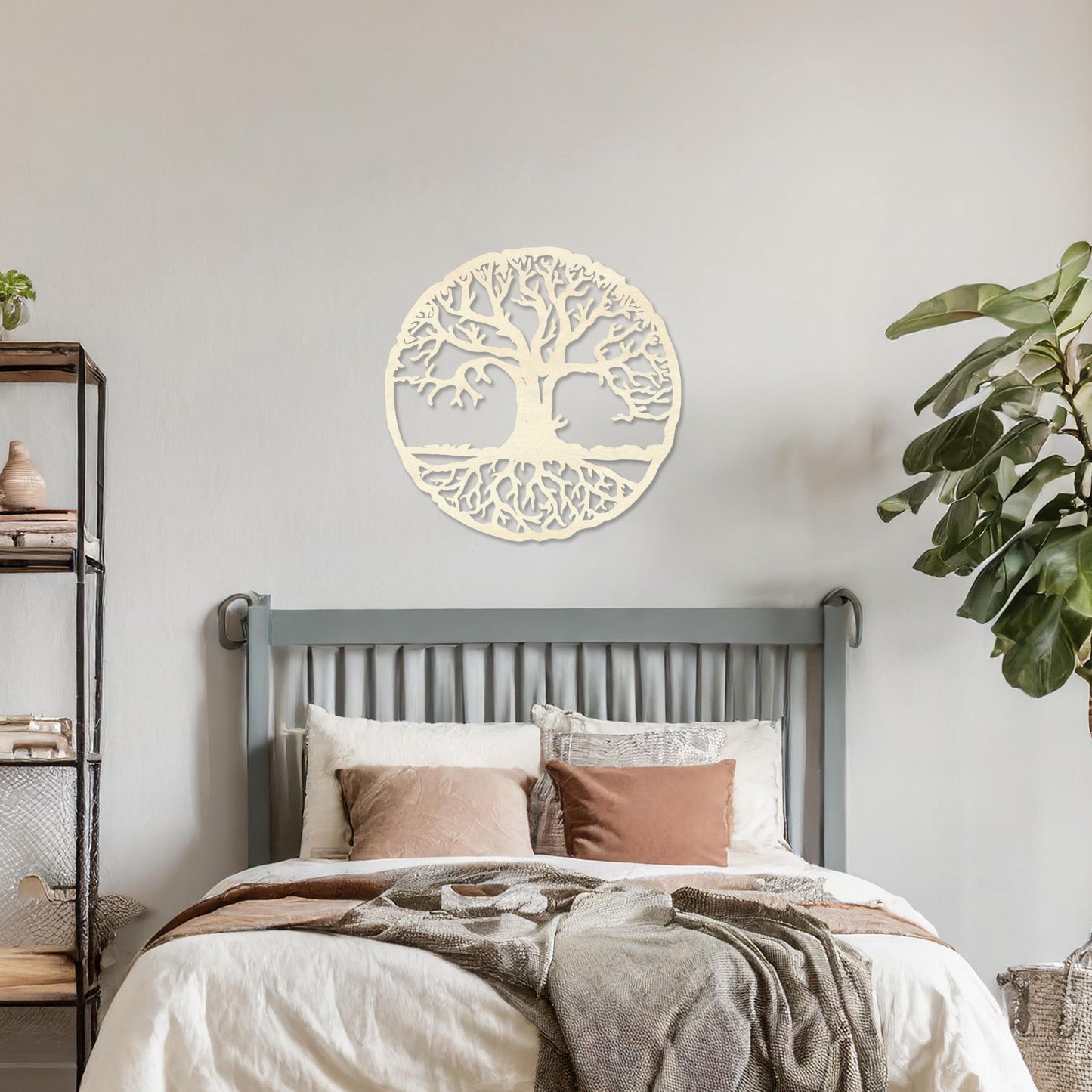 Round wooden wall art featuring an intricate tree design with sprawling branches and roots, symbolising connection and growth. Placed on a neutral wall in a modern room decor, this piece exudes a harmonious and earthy charm.