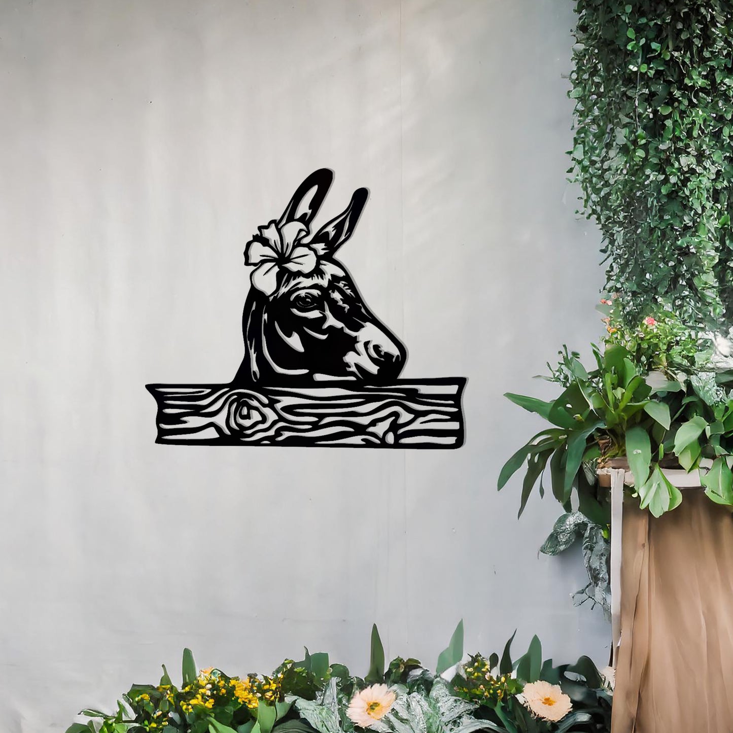 This wall art design showcases a beautifully detailed donkey head adorned with a flower, resting atop a wooden plank-like base. A charming and rustic piece perfect for farmhouse decor or animal enthusiasts.