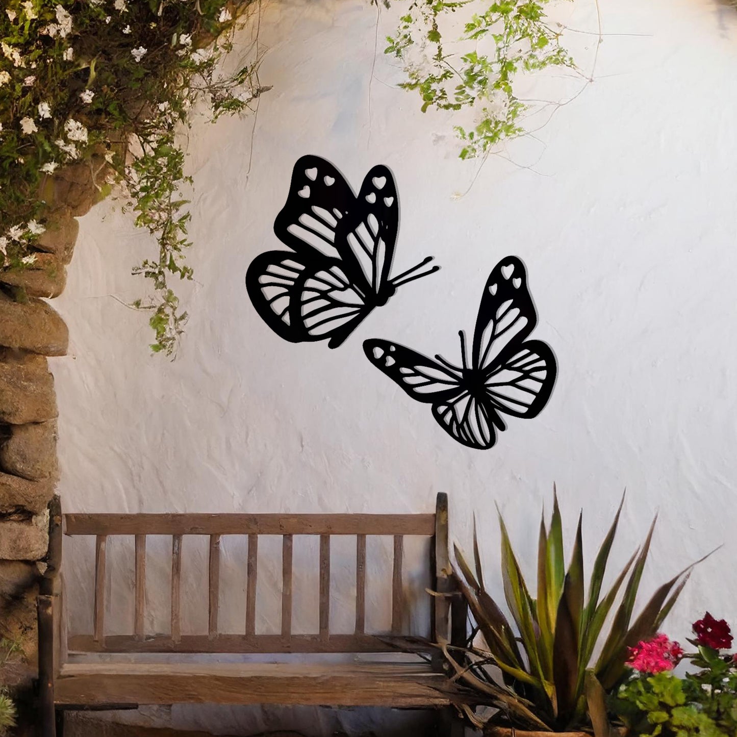 This design showcases a pair of intricately detailed butterflies in flight, their delicate wings adorned with heart-shaped accents. A charming addition to any space, celebrating the beauty of nature and the grace of butterflies.