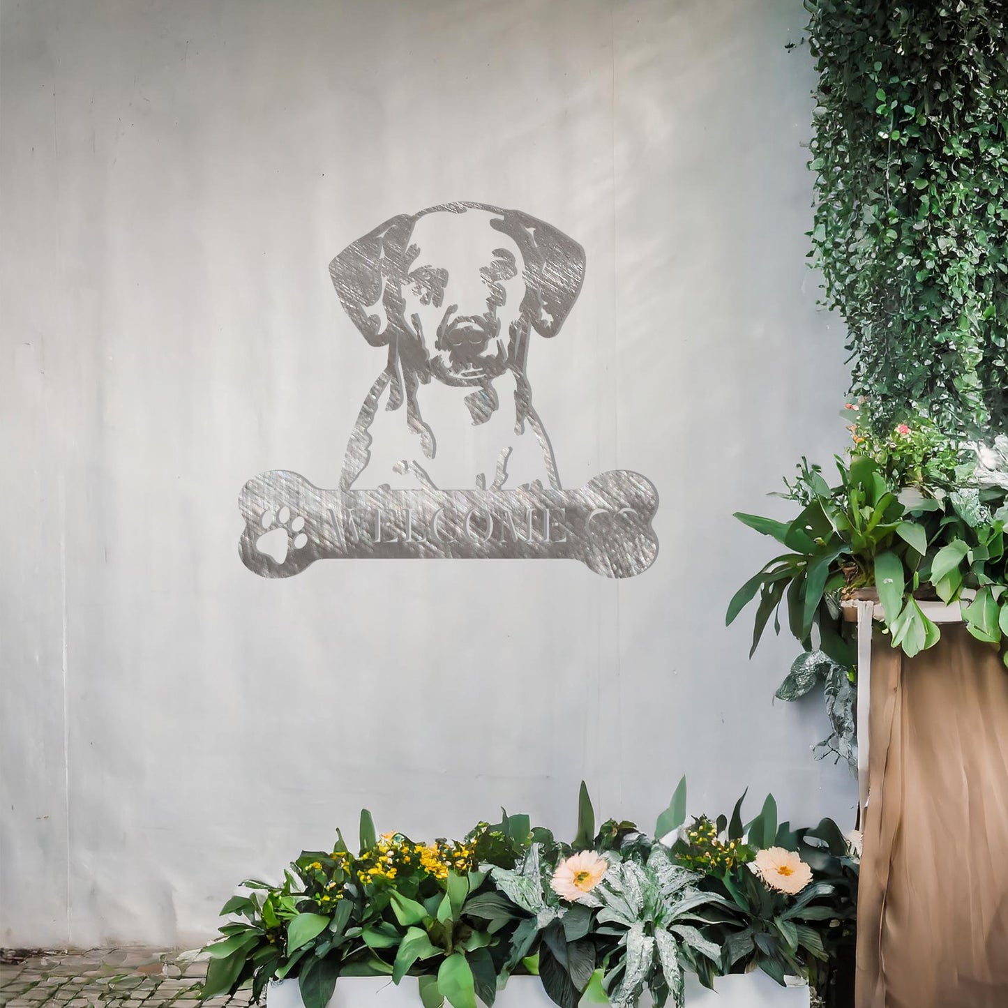 Metal Dalmatian dog design with a bone-shaped 'WELCOME' text and paw prints, perfect for adding a friendly and welcoming touch to entryways or outdoor spaces.
