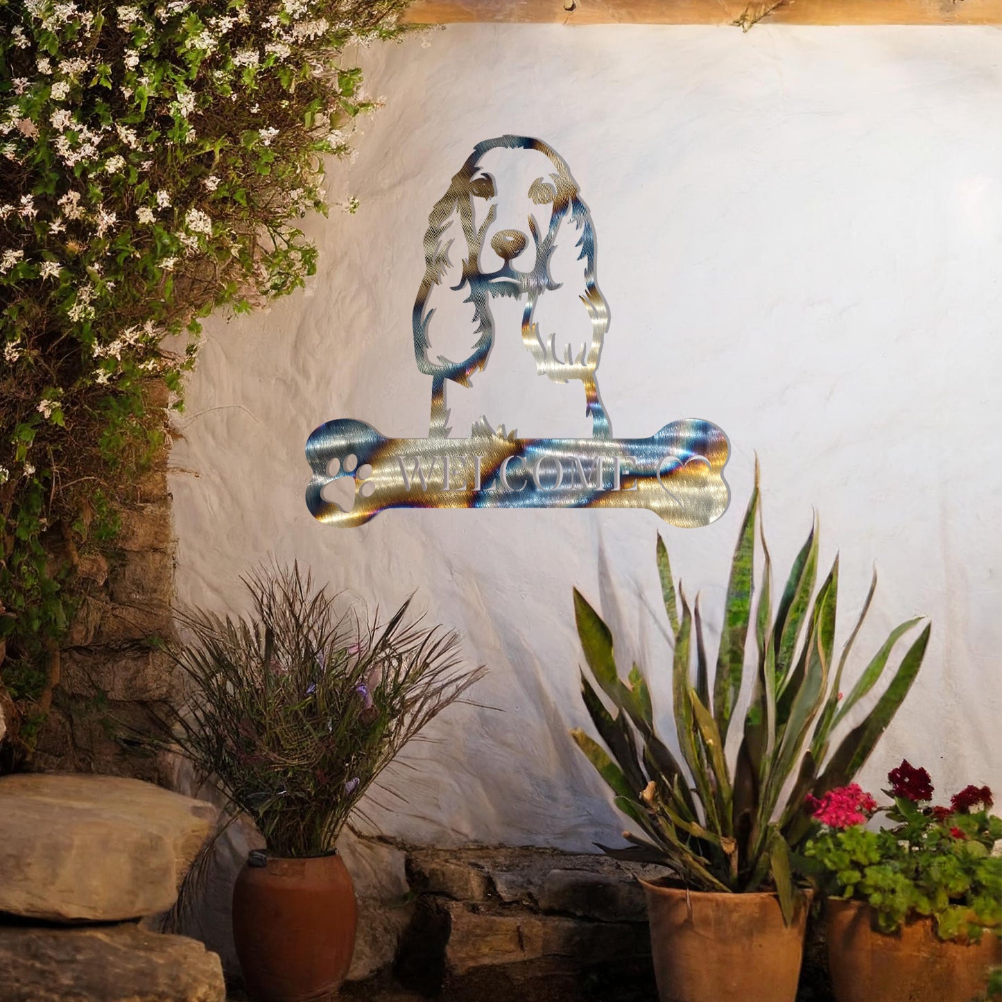 Metal Cocker Spaniel dog design with a bone-shaped 'WELCOME' text and paw prints, perfect for adding a friendly and welcoming touch to entryways or outdoor spaces.