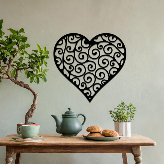 Metal wall art featuring a heart-shaped design with intricate swirling patterns, adding an elegant and romantic touch to the room’s decor.