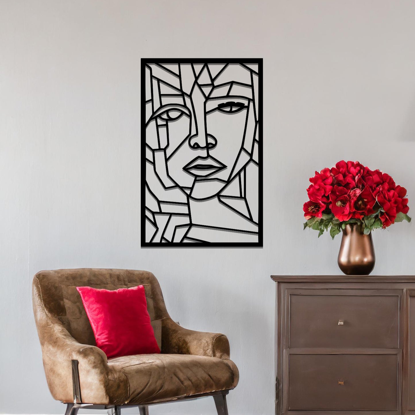 Abstract geometric face design with angular lines and sharp contours, creating a unique and modern look. The art is displayed on a neutral wall in a stylish room with contemporary furniture and vibrant flowers.