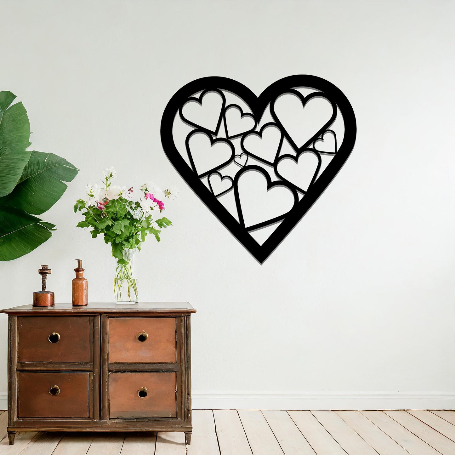 Modern heart-shaped wall art featuring a pattern of interconnected hearts, creating a stylish and romantic accent for your living space.