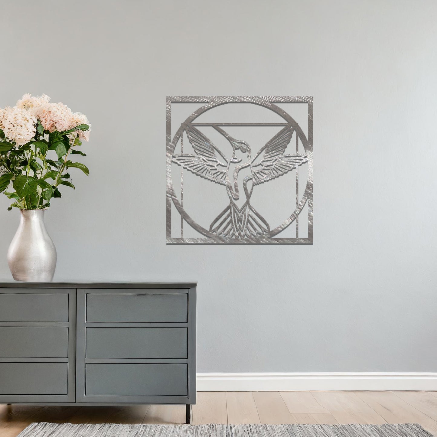 Square wall art featuring a hummingbird in a geometric frame, its wings spread gracefully within a circular design, adding a harmonious and elegant focal point to your space.