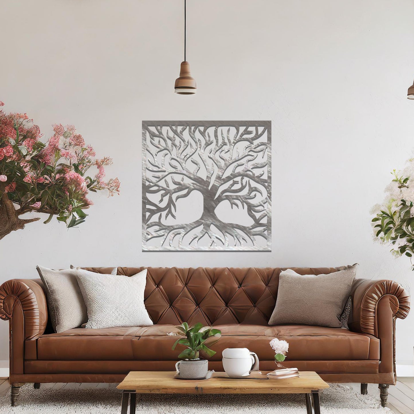 Wall art design showcasing a silhouette of a tree with intricate branches and roots, framed in a square, symbolising strength and growth through its detailed organic pattern.