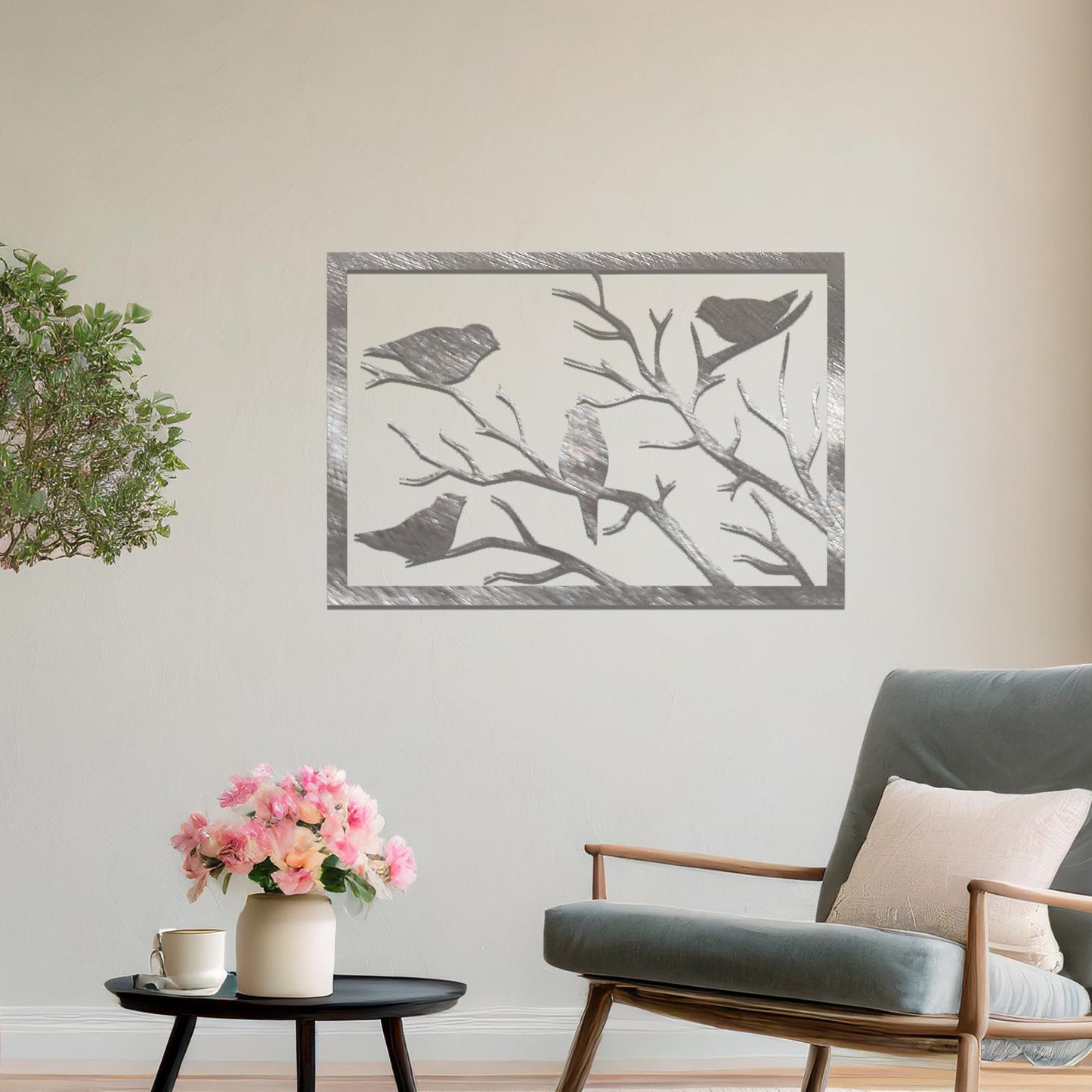Metal wall art featuring a rectangular design of birds perched on bare branches, showcasing intricate silhouettes and adding a touch of nature-inspired charm to the interior space.