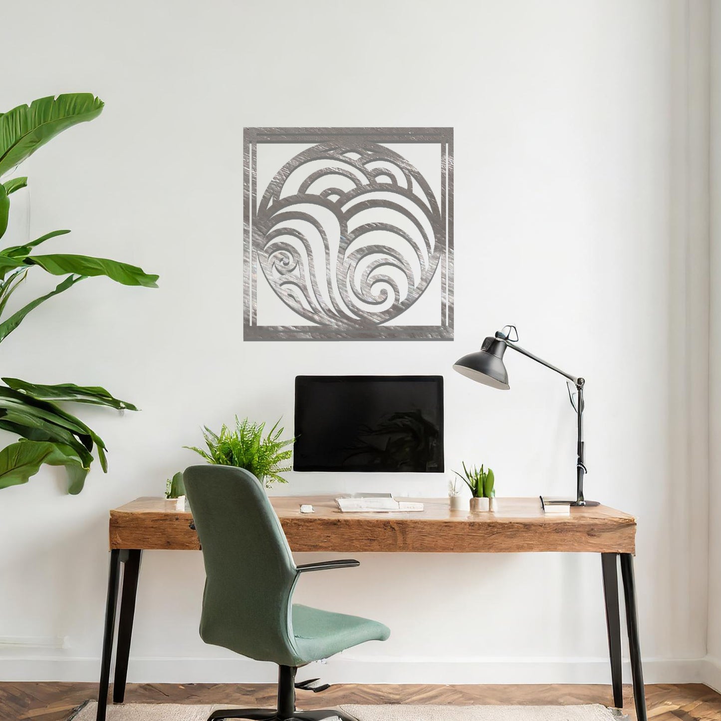 Metal wall art featuring a square design with swirling wave patterns inside a circular frame, mounted on a neutral wall within modern decor. The flowing lines and fluid shapes create a peaceful and dynamic focal point, enhancing the space.