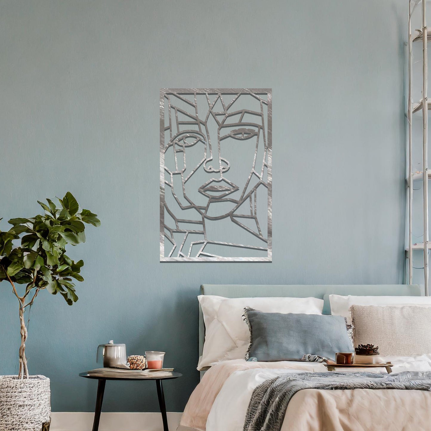 Abstract geometric face design with angular lines and sharp contours, creating a unique and modern look. The art is displayed on a neutral wall in a stylish room with contemporary furniture and vibrant flowers.
