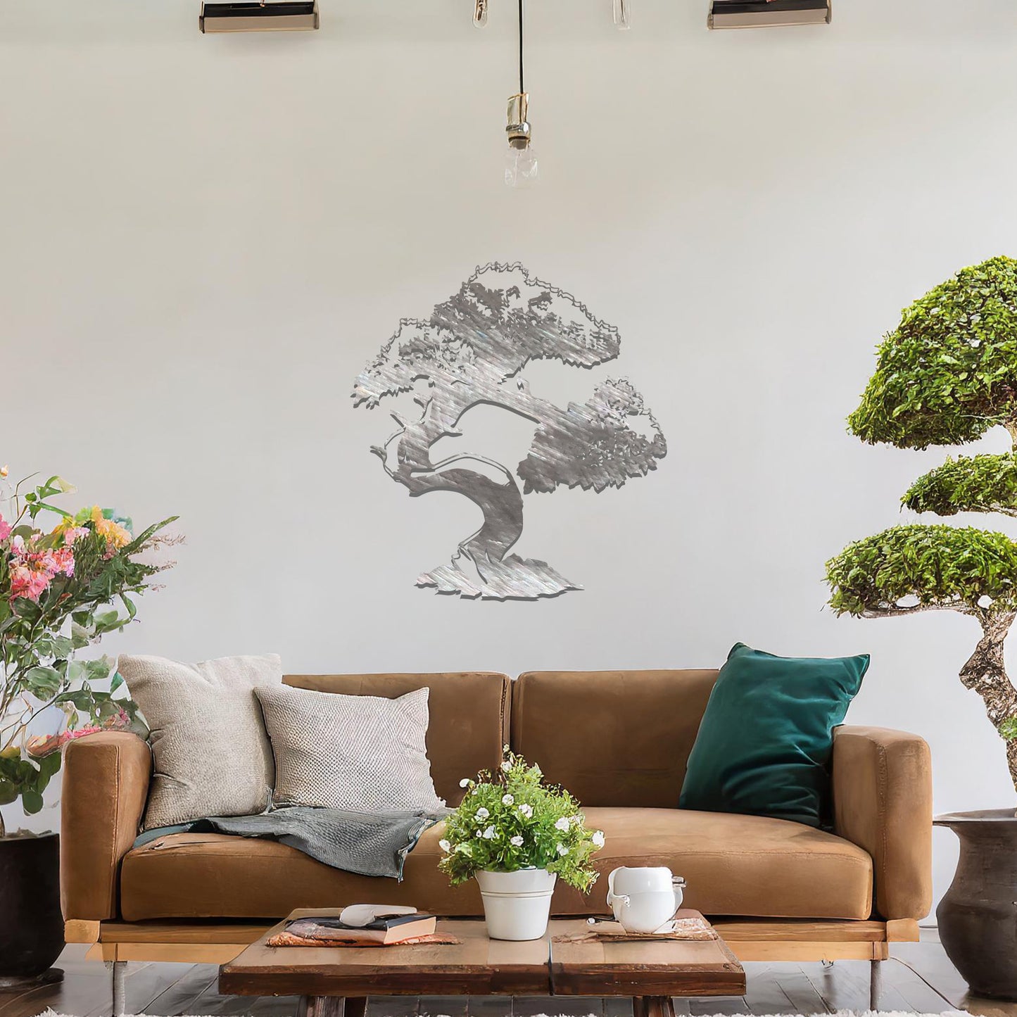 Metal wall art featuring a beautifully detailed bonsai tree design with a gracefully twisted trunk and a lush, intricate canopy, adding an elegant and nature-inspired focal point to the room's decor.