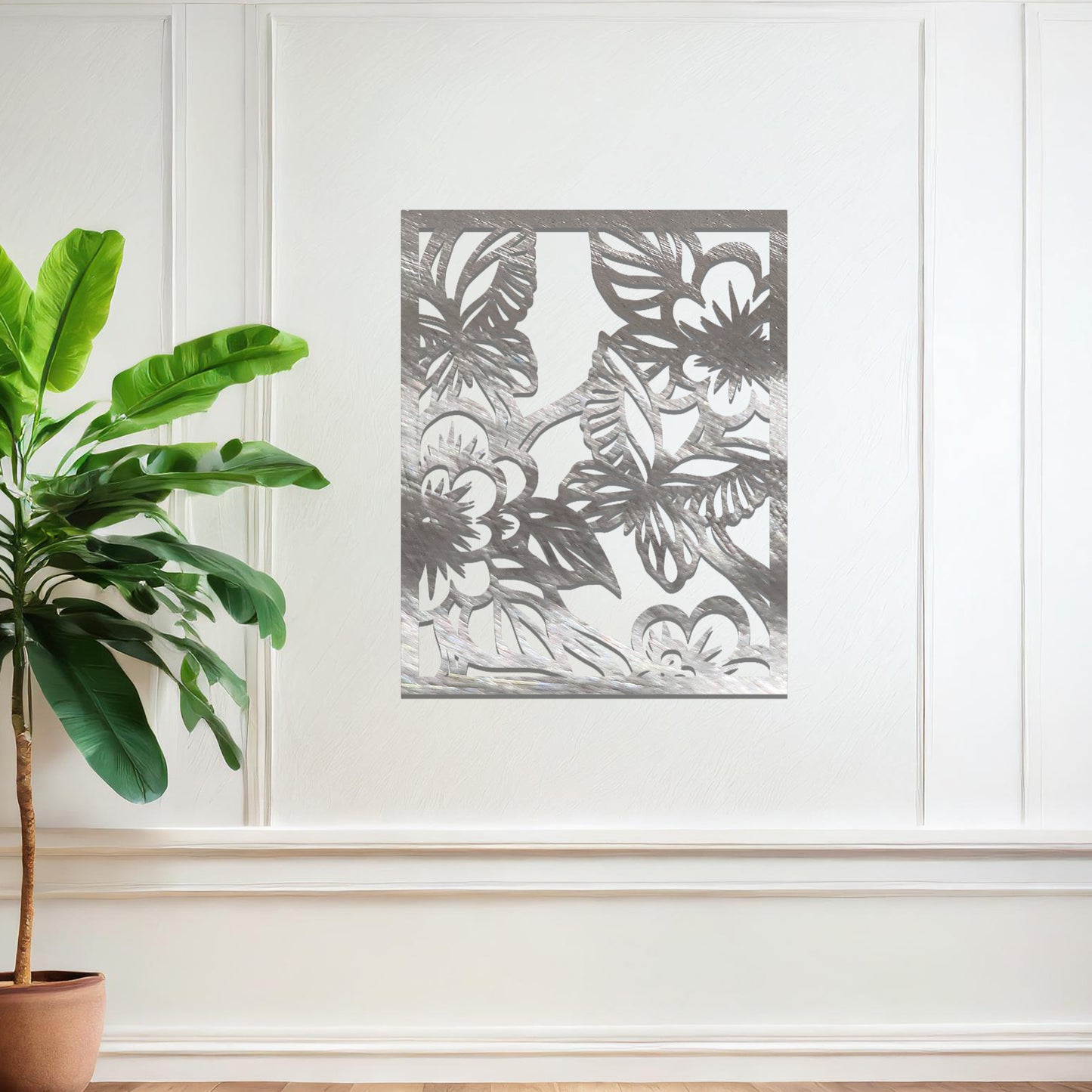 Metal wall art featuring a square design with a floral motif of blooming flowers and intricate leaves, mounted on a neutral wall within modern bedroom decor. The delicate detailing and natural theme create a soothing and elegant focal point, enhancing the space's aesthetic.
