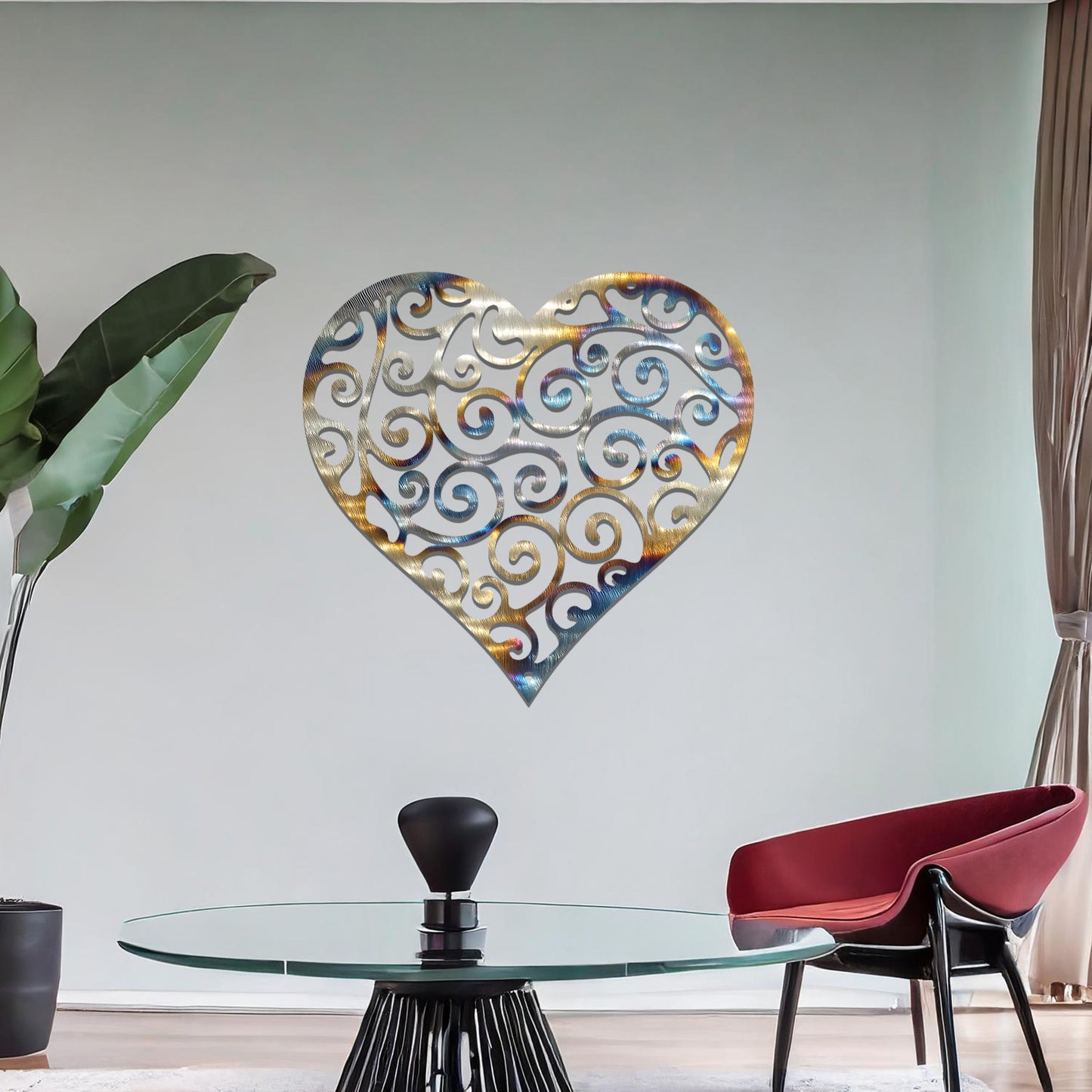 Metal wall art featuring a heart-shaped design with intricate swirling patterns, adding an elegant and romantic touch to the room’s decor.