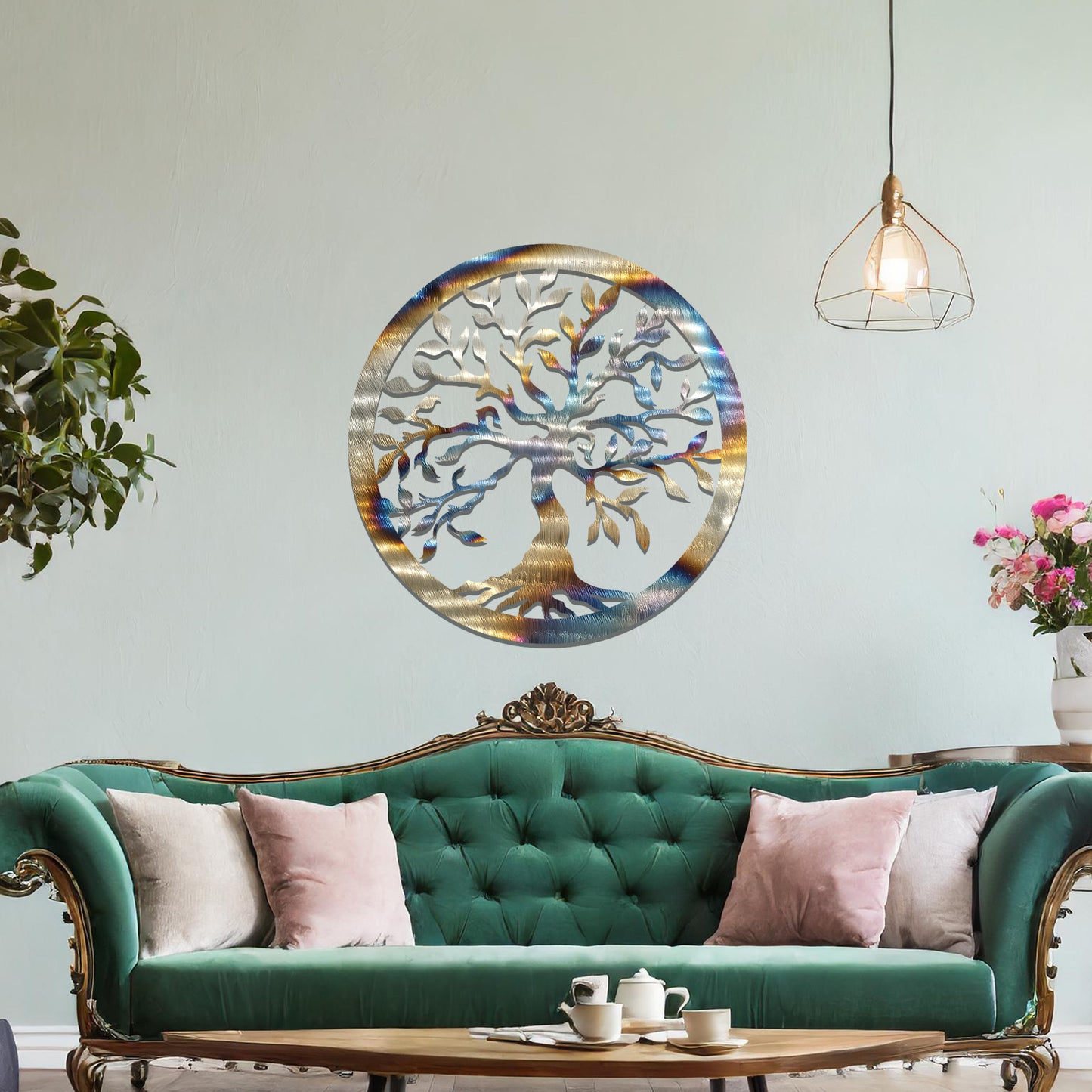 Metal wall art featuring a circular tree of life design with intricate branches and leaves, mounted on a neutral wall within modern bedroom decor. The detailed craftsmanship and symbolic motif create a calming and elegant focal point in the room.