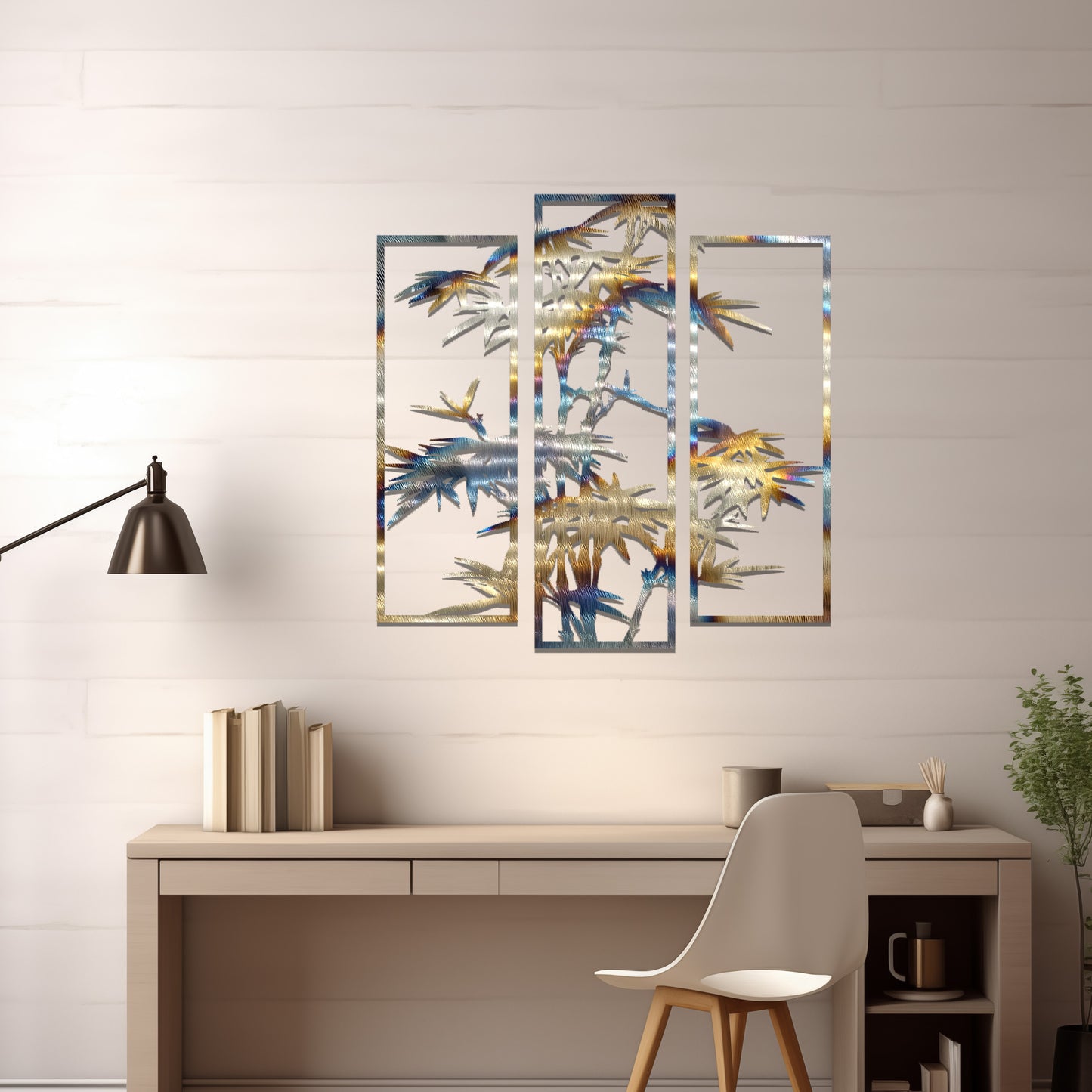 Metal wall art featuring a three-panel bamboo design with intricate leaves and stems, crafted with precise laser-cut detailing, displayed on a neutral wall within modern decor.