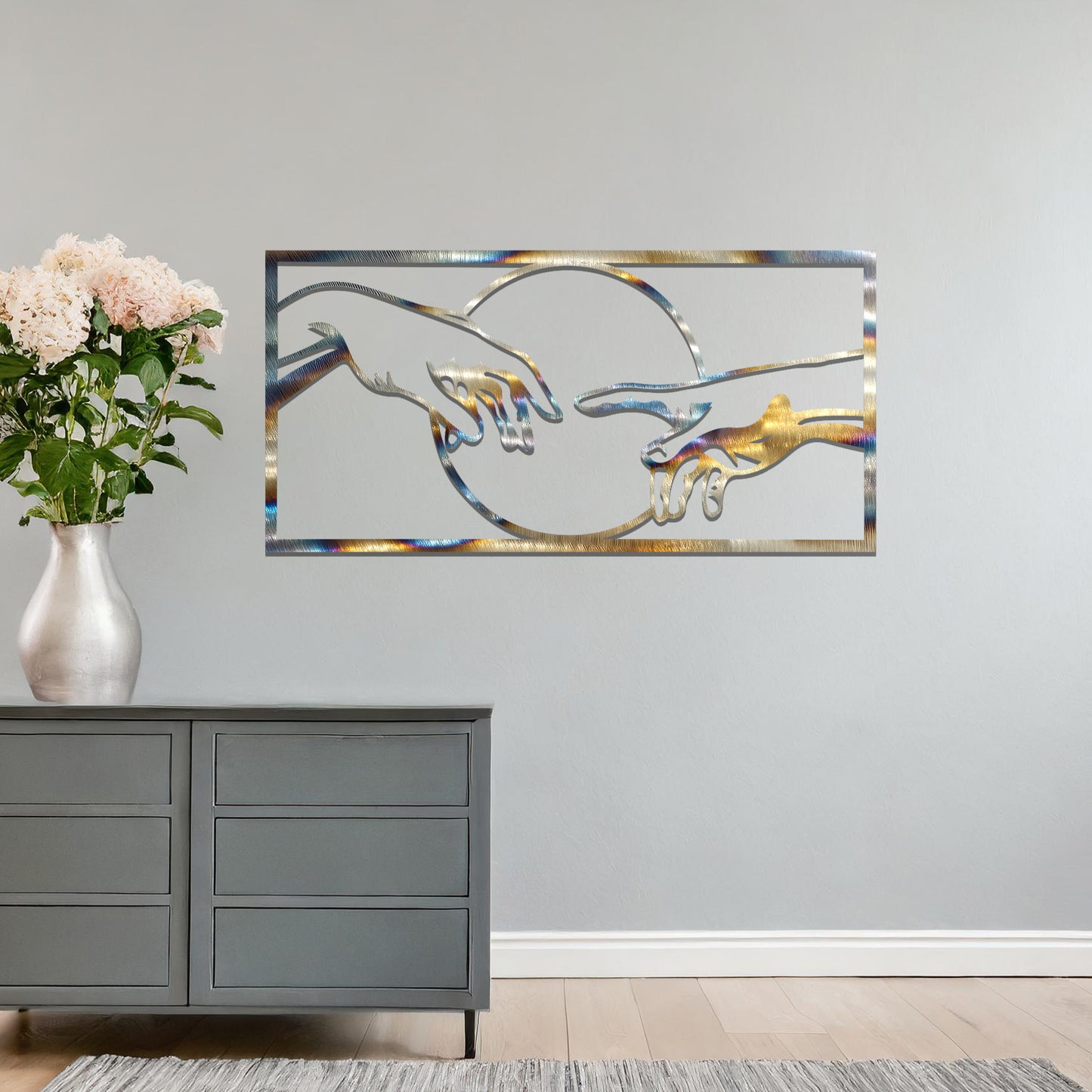 Inspired by Michelangelo’s "Creation of Adam," this artistic design captures the iconic moment of two hands almost touching within a circular frame. A timeless representation of connection and artistry.