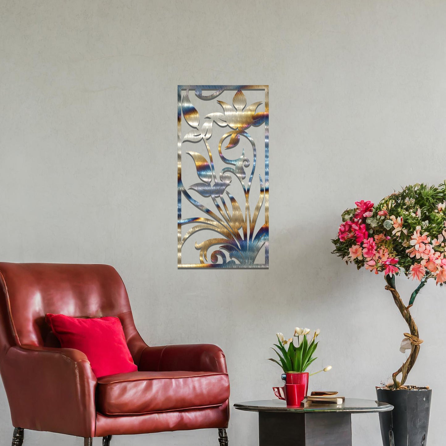 Metal wall art featuring a vertical design with elegant floral motifs and intricate swirling patterns, mounted on a neutral wall within sophisticated room decor. The delicate floral silhouette adds a refined and artistic touch to the space.