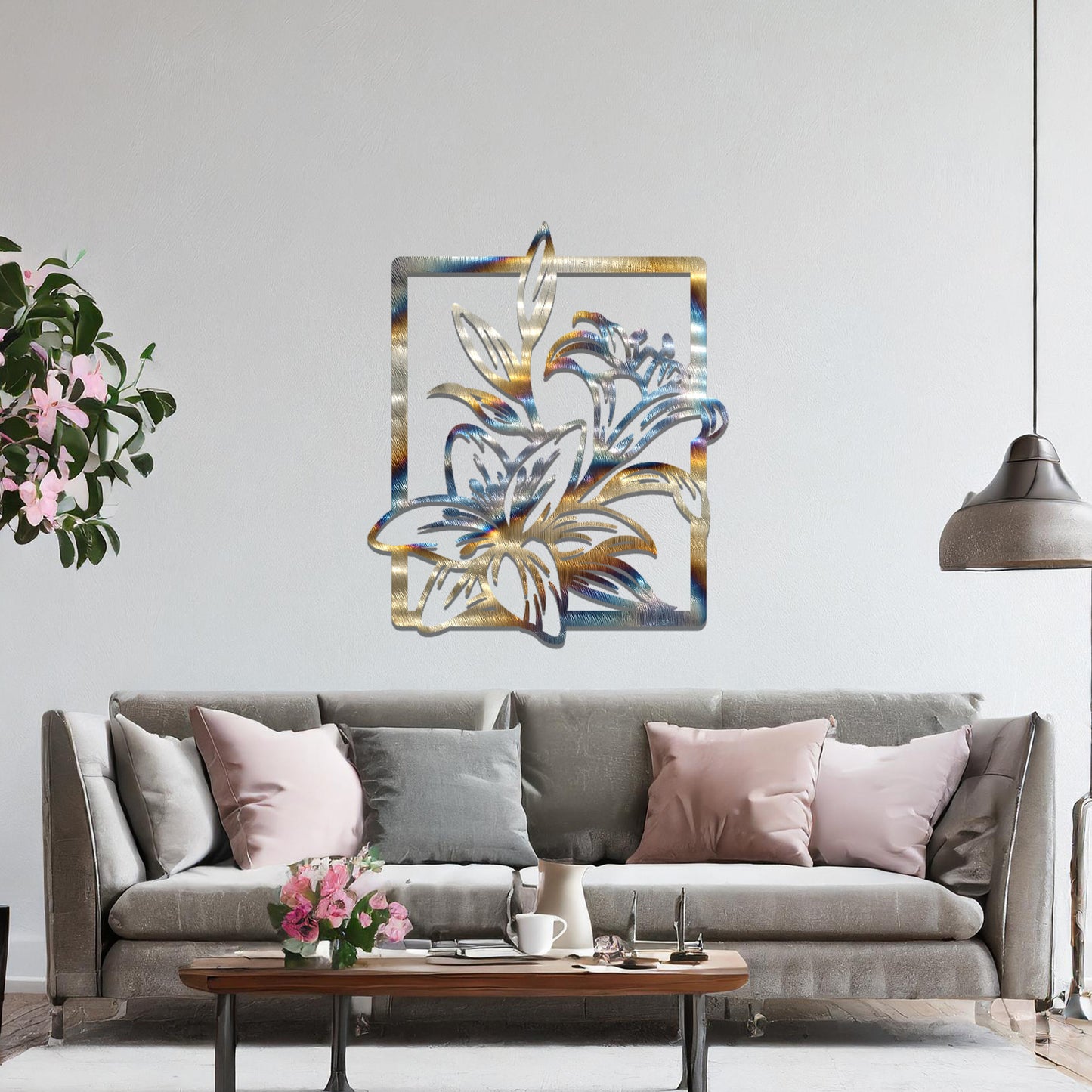 Metal wall art featuring a rectangular design with elegant floral motifs, including detailed lilies and leaves, adding a touch of sophistication and natural beauty to the space.