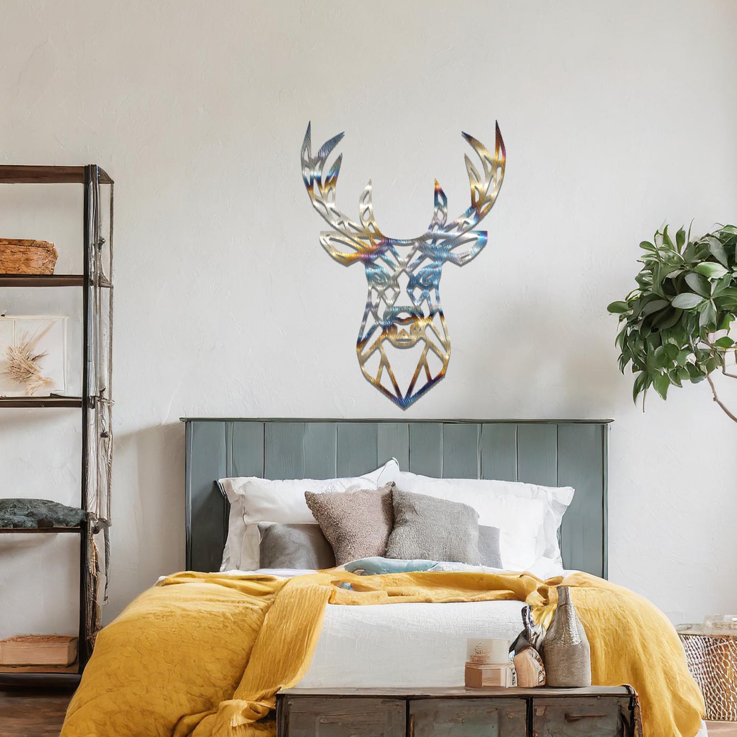 Metal wall art featuring a geometric deer head design with intricate detailing, crafted with precise laser-cut techniques, displayed on a neutral wall within modern decor.