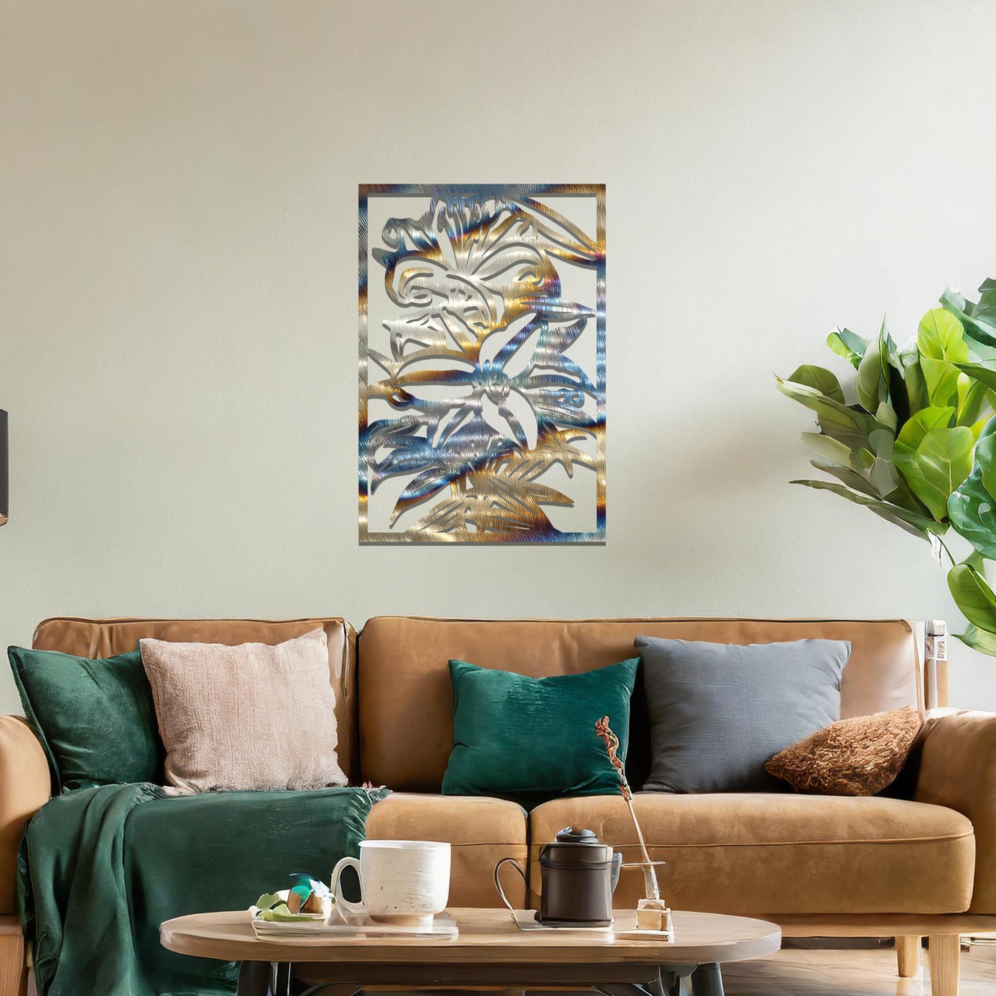 A metal wall art design showcasing a floral pattern with a large flower and leaves, set within a rectangular frame. The art is displayed on a neutral wall in a modern living room, adding an elegant and natural touch to the space.