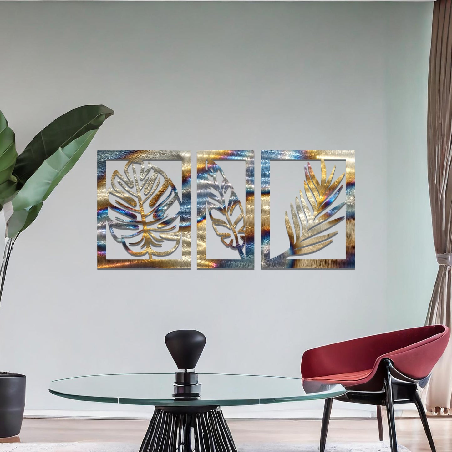 Metal wall art featuring a three-panel design with detailed leaf patterns, mounted on a neutral wall within modern decor. The organic motifs and rust finish create a natural, earthy focal point, enhancing the room's aesthetic.
