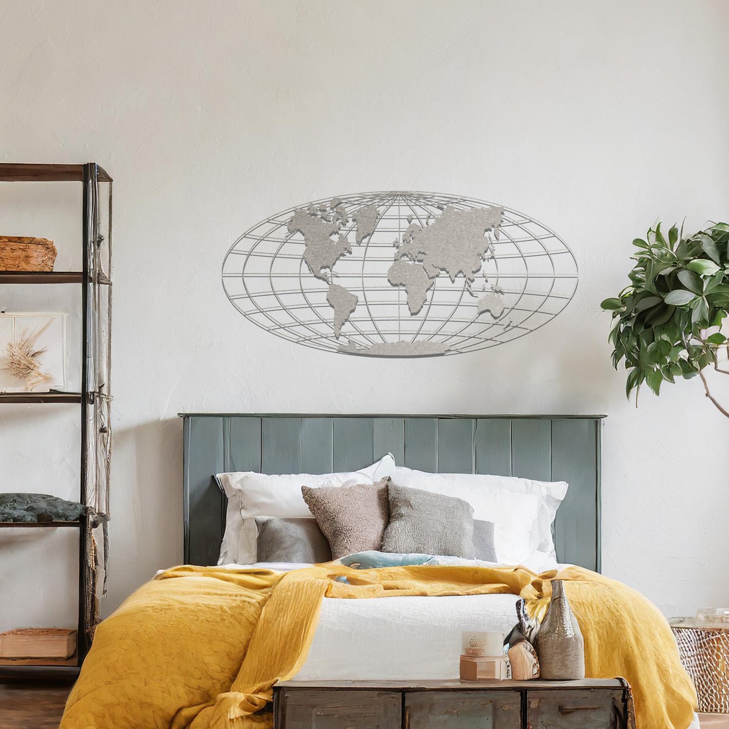 Metal wall art featuring a detailed world map design within an oval grid pattern, crafted with precise laser-cut techniques, displayed on a neutral wall within modern decor.