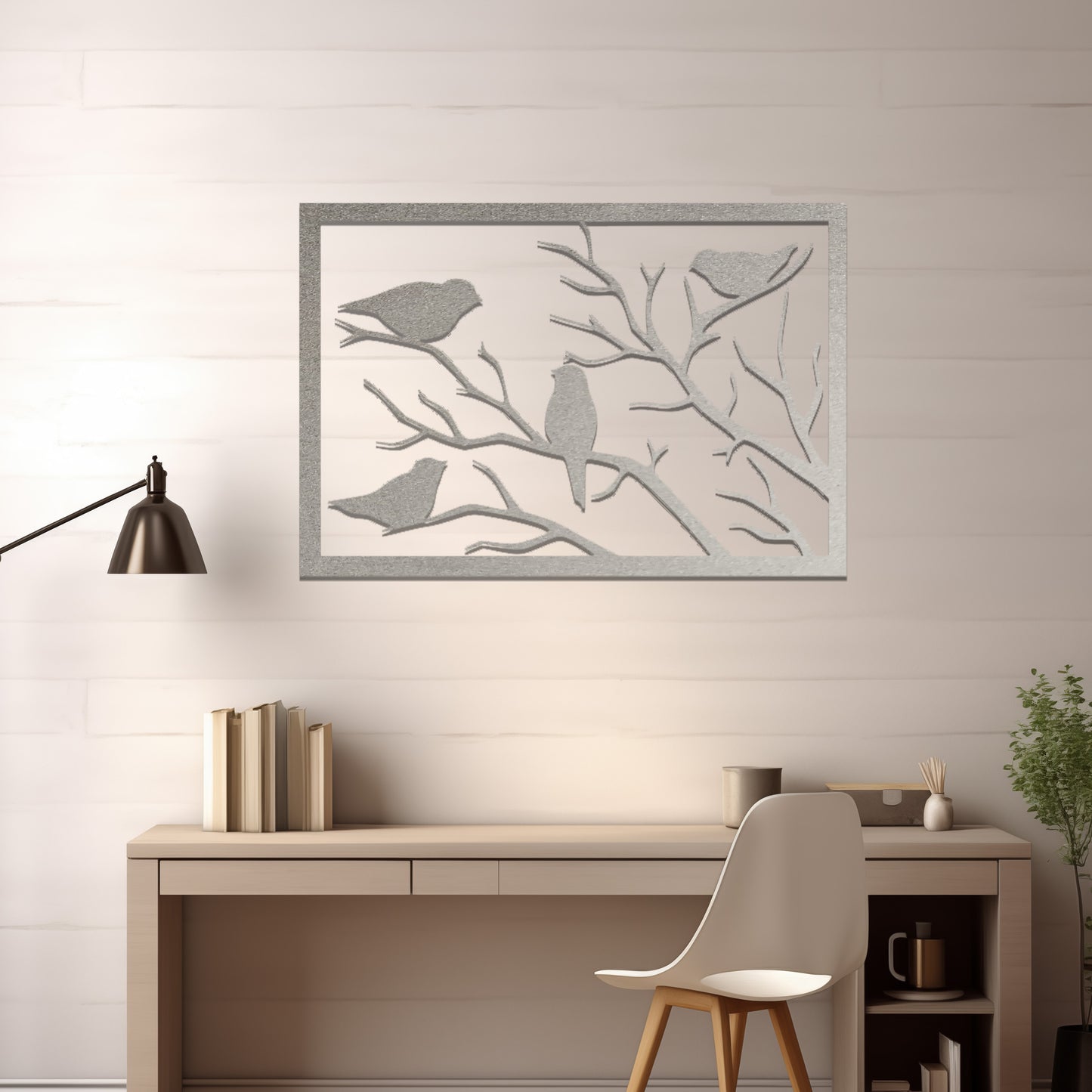 Metal wall art featuring a rectangular design of birds perched on bare branches, showcasing intricate silhouettes and adding a touch of nature-inspired charm to the interior space.
