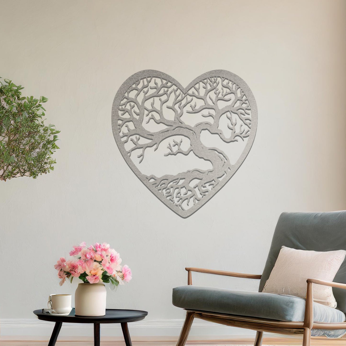 Metal wall art featuring a heart-shaped design with a detailed tree and intricate branching pattern, creating a striking and artistic focal point for the room.
