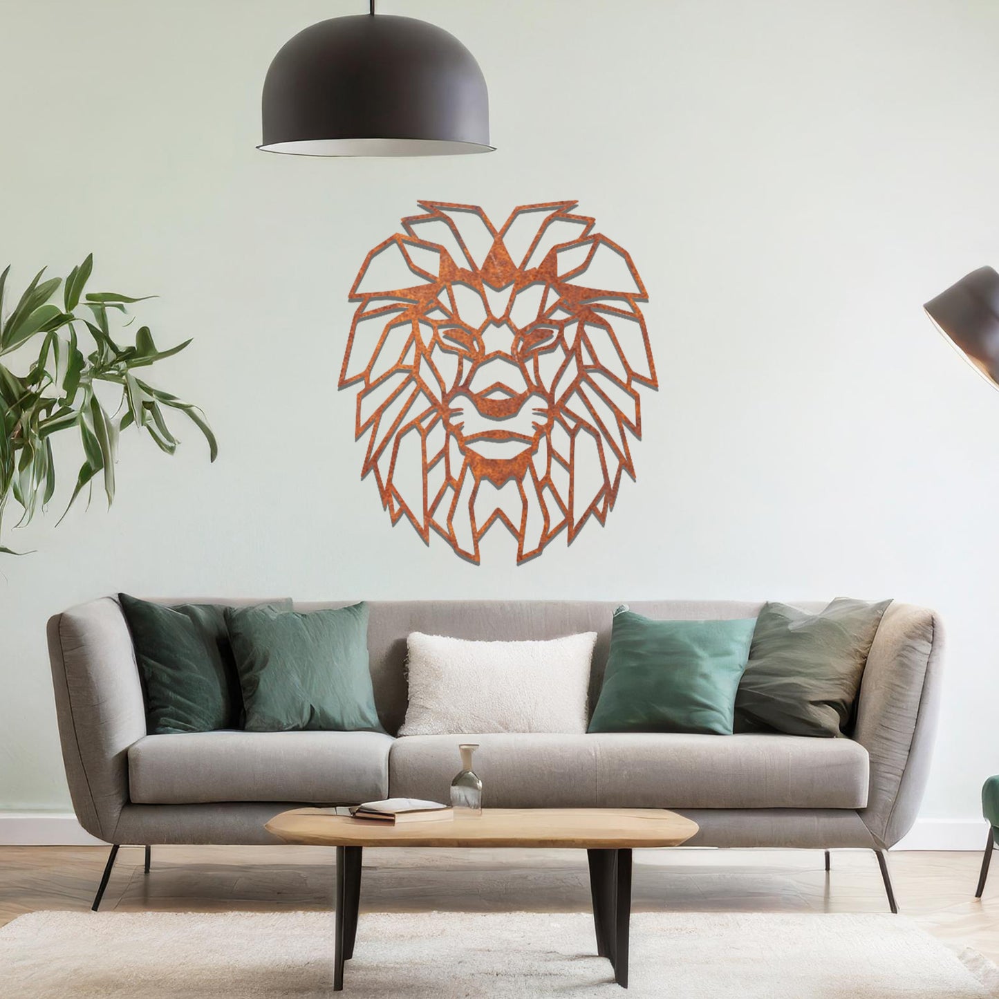 Metal wall art featuring a geometric lion head design with intricate angular detailing, crafted with precise laser-cut techniques, displayed on a neutral wall within modern decor.