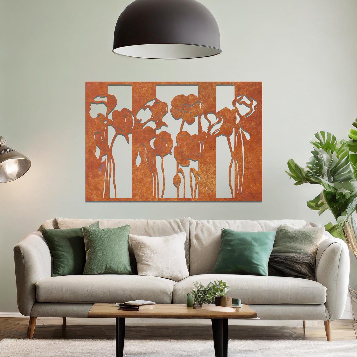 A metal wall art design featuring stylized flowers with long, elegant stems, arranged vertically in a series of three sections. The art is displayed on a neutral wall within a modern room decor, adding a contemporary and artistic touch to the space.
