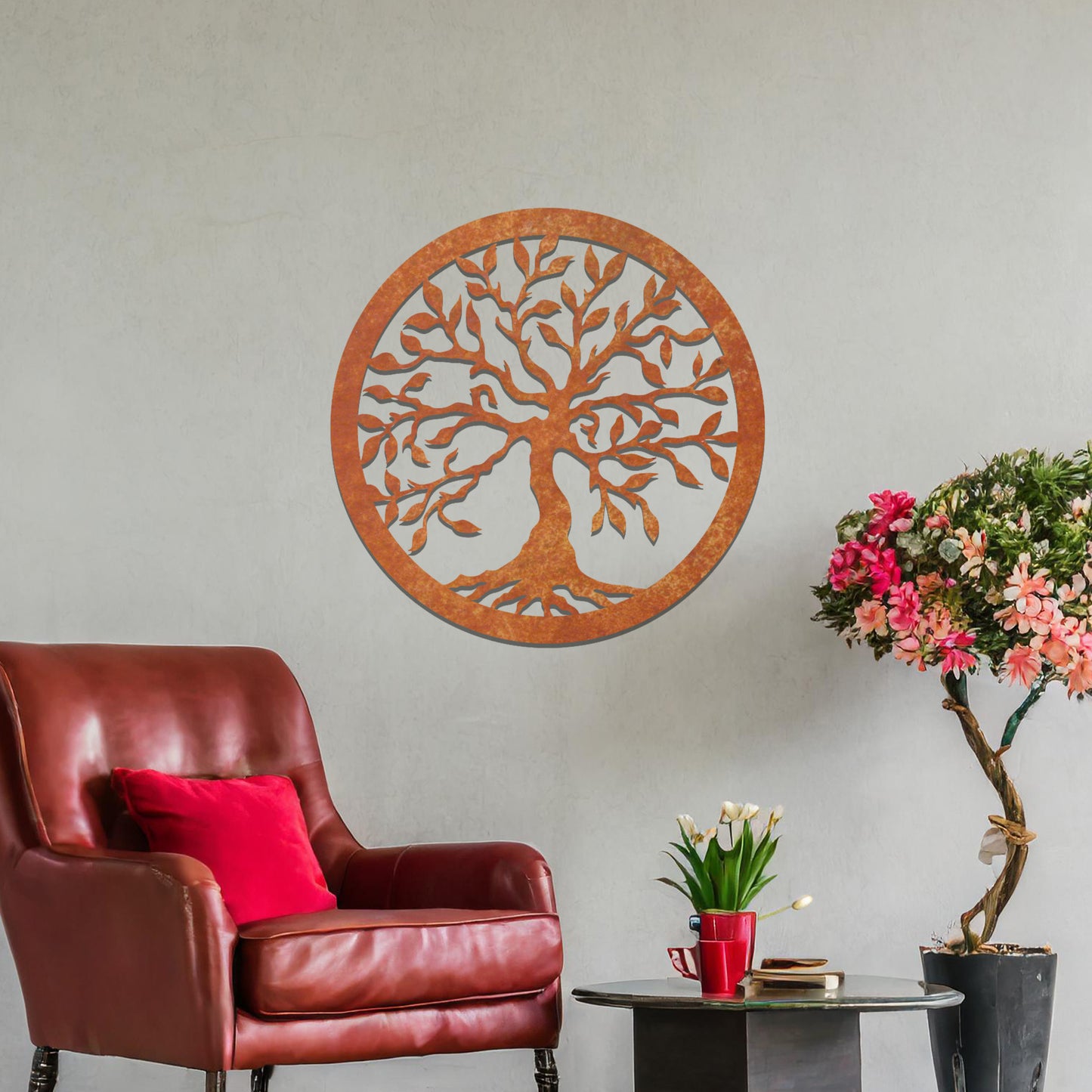 Metal wall art featuring a circular tree of life design with intricate branches and leaves, mounted on a neutral wall within modern bedroom decor. The detailed craftsmanship and symbolic motif create a calming and elegant focal point in the room.