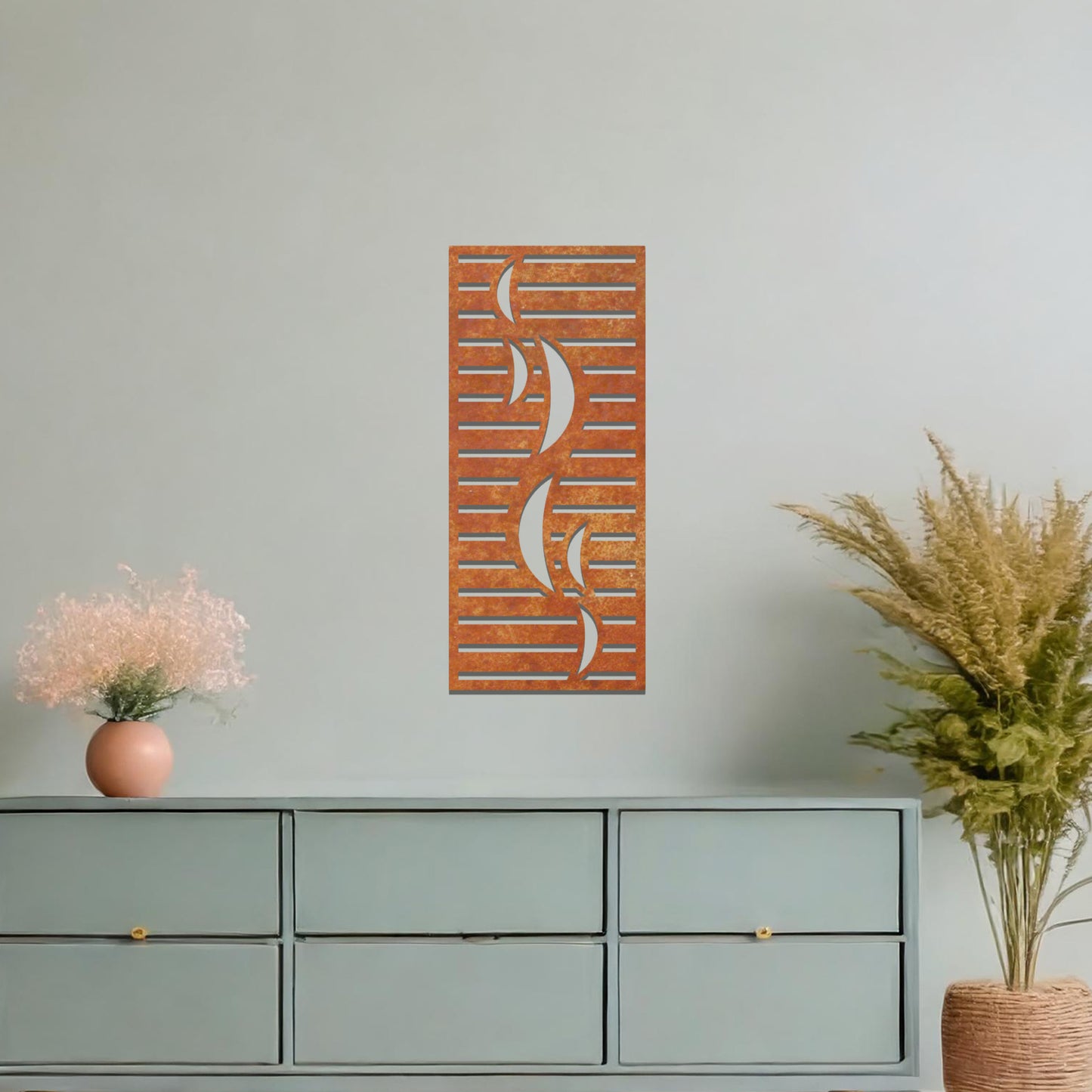 A sleek and modern metal wall art design featuring curving abstract shapes set against horizontal stripes, creating a dynamic and contemporary look. The artwork is displayed on a neutral wall within a stylish, minimalistic setting.