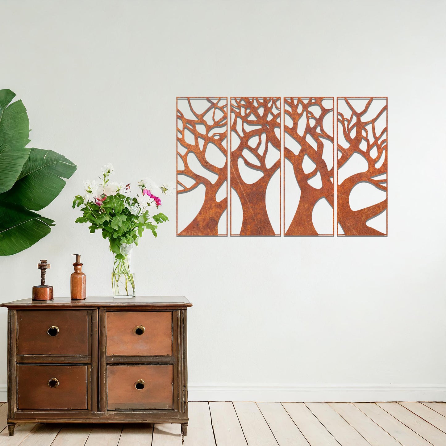 Metal wall art featuring a four-panel design of interconnected tree trunks and branches, showcasing intricate details and organic shapes, creating a striking and nature-inspired statement piece for the interior.