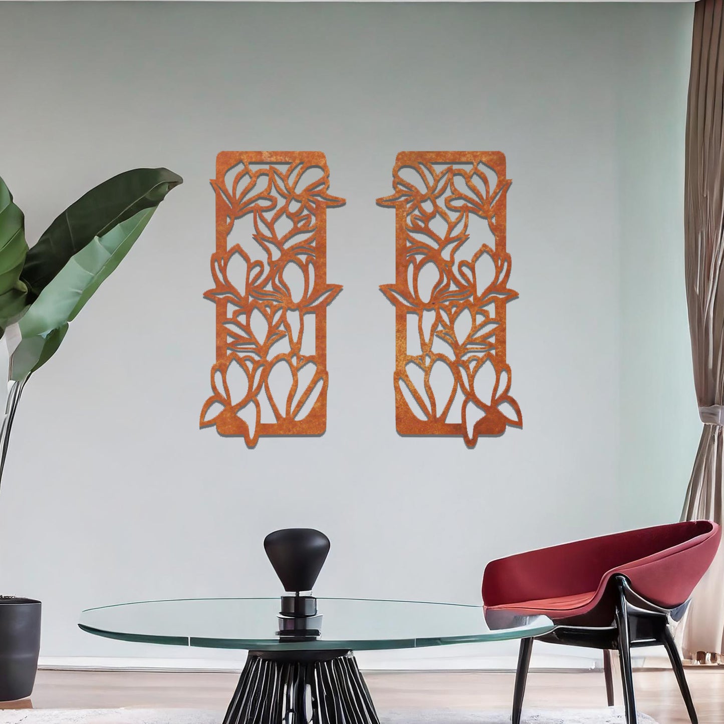 Metal wall art featuring a pair of vertical panels with floral-inspired designs of intertwined stems and leaves, crafted with precise laser-cut detailing, displayed on a neutral wall within modern decor.