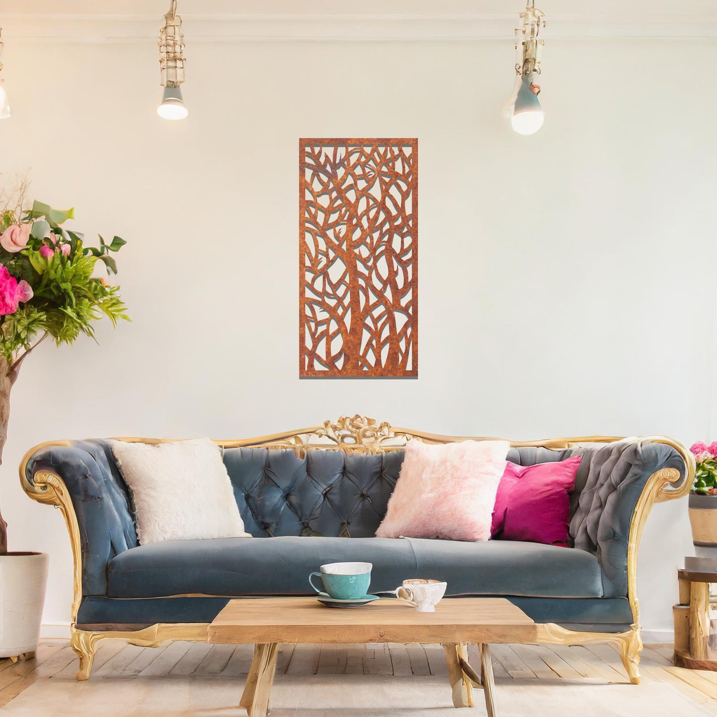 Metal wall art featuring a rectangular design with intricate tree branches and abstract shapes, creating a visually captivating and artistic focal point for the room.