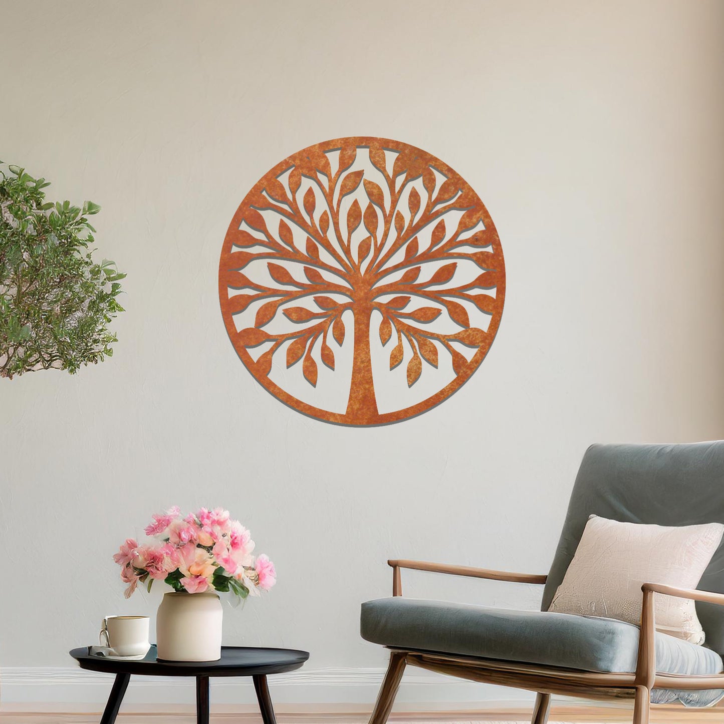 Metal wall art featuring a circular tree design with symmetrical branches and leaves, creating a balanced and nature-inspired focal point for the room.