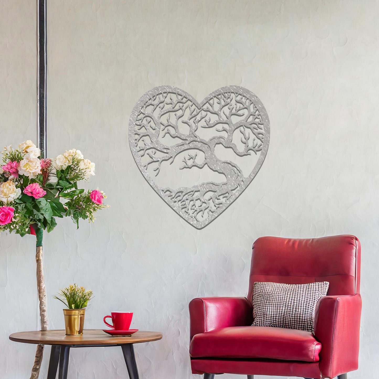 Metal wall art featuring a heart-shaped design with a detailed tree and intricate branching pattern, creating a striking and artistic focal point for the room.
