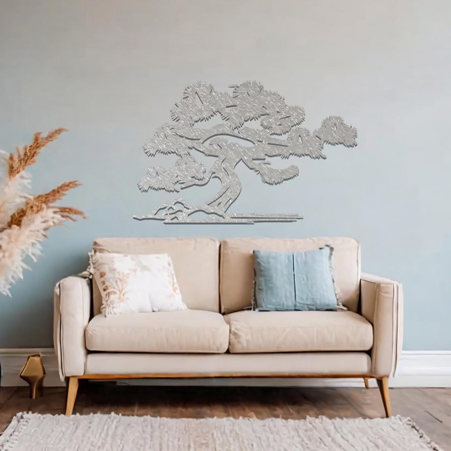 Metal wall art showcasing a serene bonsai tree design with flowing branches and a textured trunk, adding an artistic and calming element to the living space.
