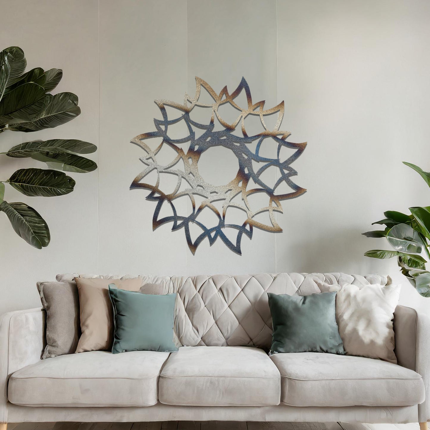 Metal wall art featuring a circular floral-inspired design with layered petal-like patterns, crafted with precise laser-cut detailing, displayed on a neutral wall within modern decor.
