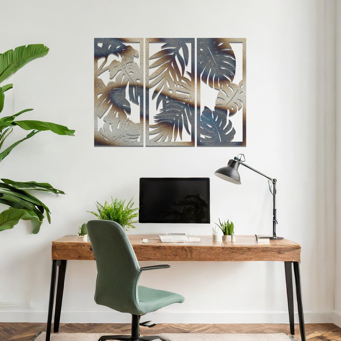 A tropical wall art set featuring a trio of panels adorned with intricate monstera and palm leaf patterns. Perfect for bringing a lush, botanical vibe to your indoor spaces.
