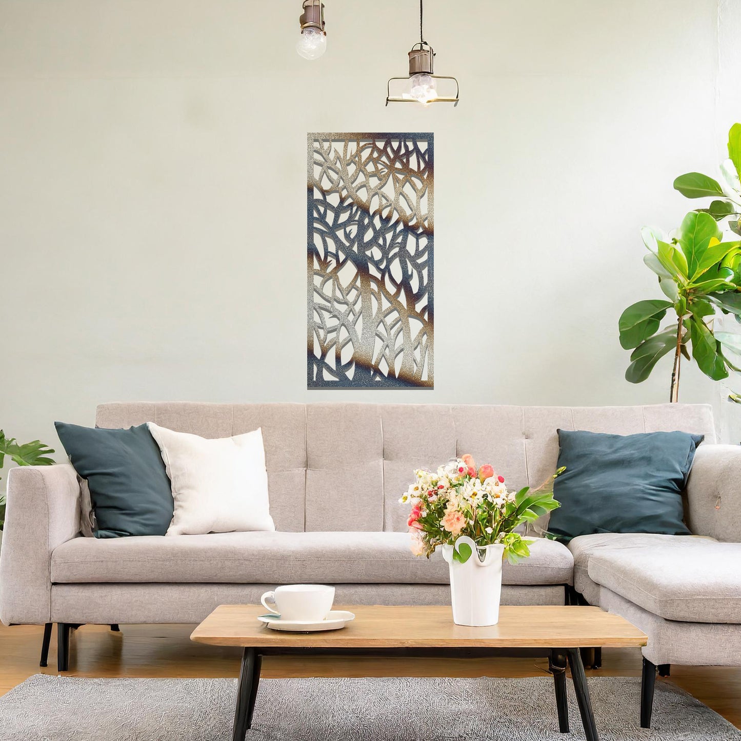 Metal wall art featuring a rectangular design with intricate tree branches and abstract shapes, creating a visually captivating and artistic focal point for the room.