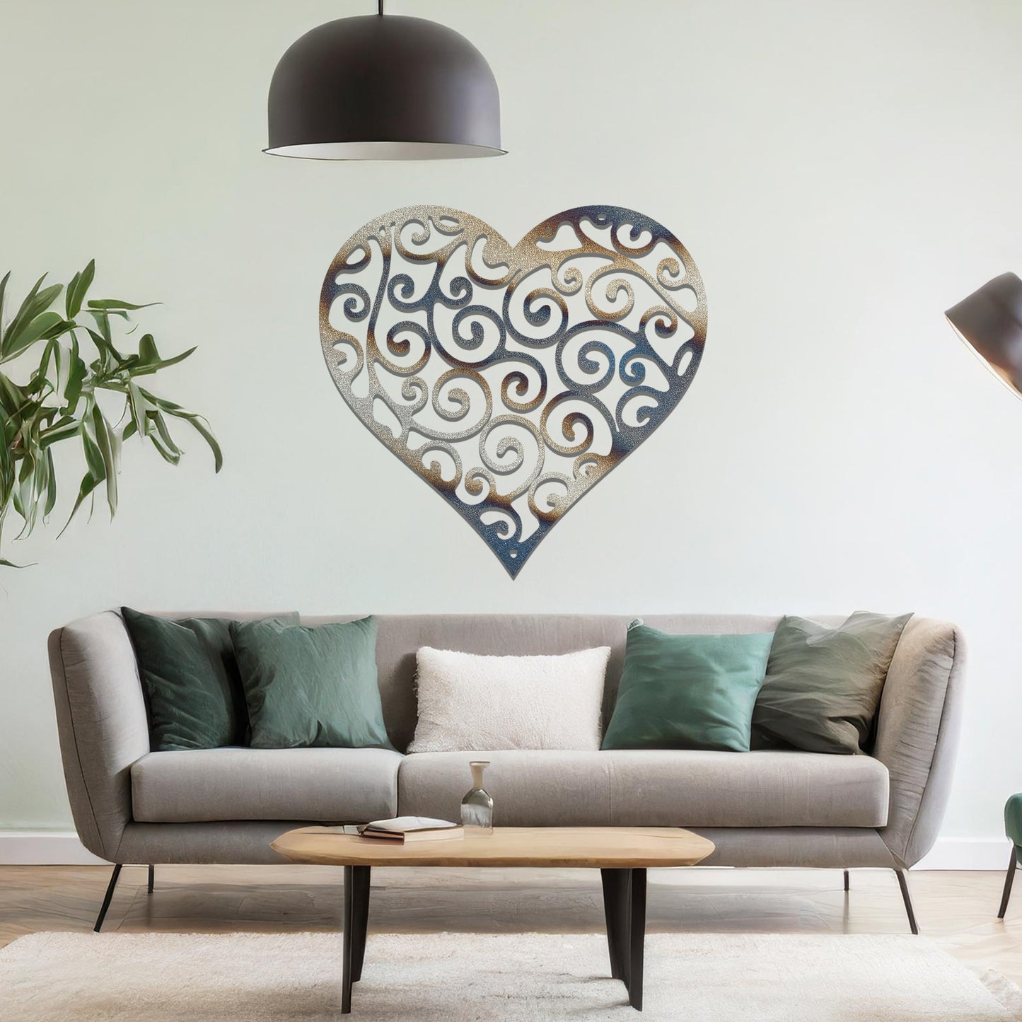 Metal wall art featuring a heart-shaped design with intricate swirling patterns, adding an elegant and romantic touch to the room’s decor.