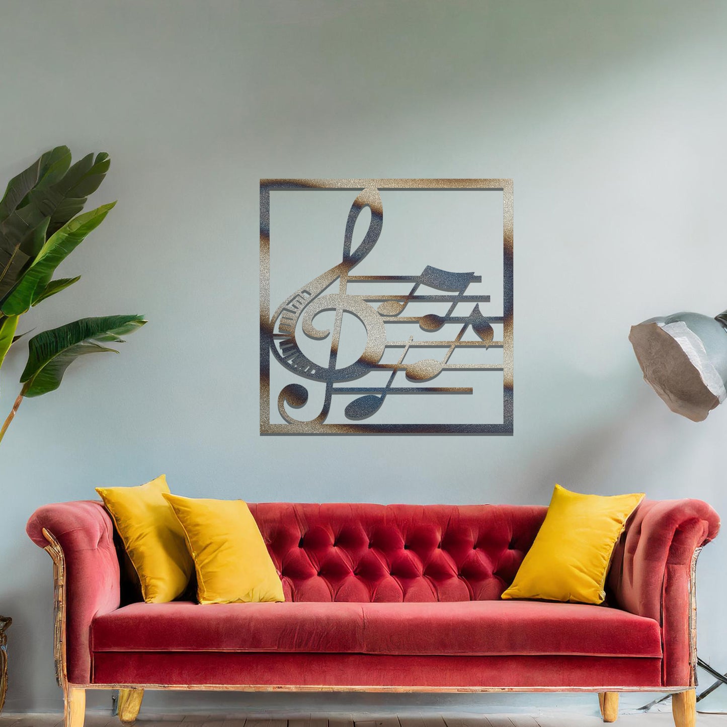 Metal wall art featuring a square design with a treble clef and musical notes on a staff, adding a harmonious and artistic touch to the space.