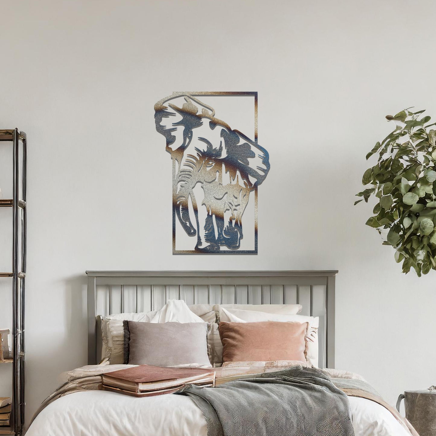 Metal wall art featuring a detailed silhouette of an elephant walking, framed by a rectangular border. The art is placed on a neutral wall in a modern office setting, adding a dynamic and nature-inspired element to the workspace decor.