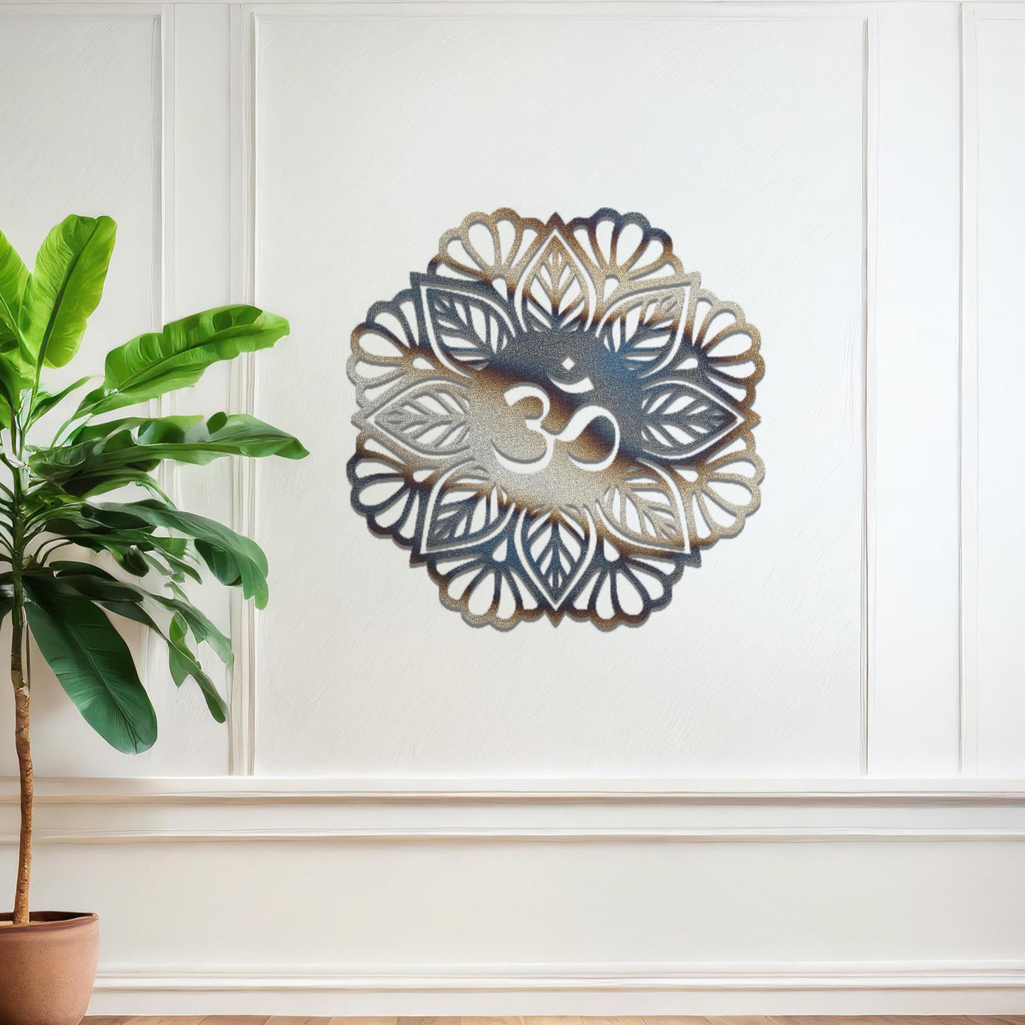 Metal wall art featuring an intricate mandala design with the Om symbol at its center, mounted on a neutral wall within modern decor. The spiritual motif and detailed craftsmanship create a calming and elegant focal point.