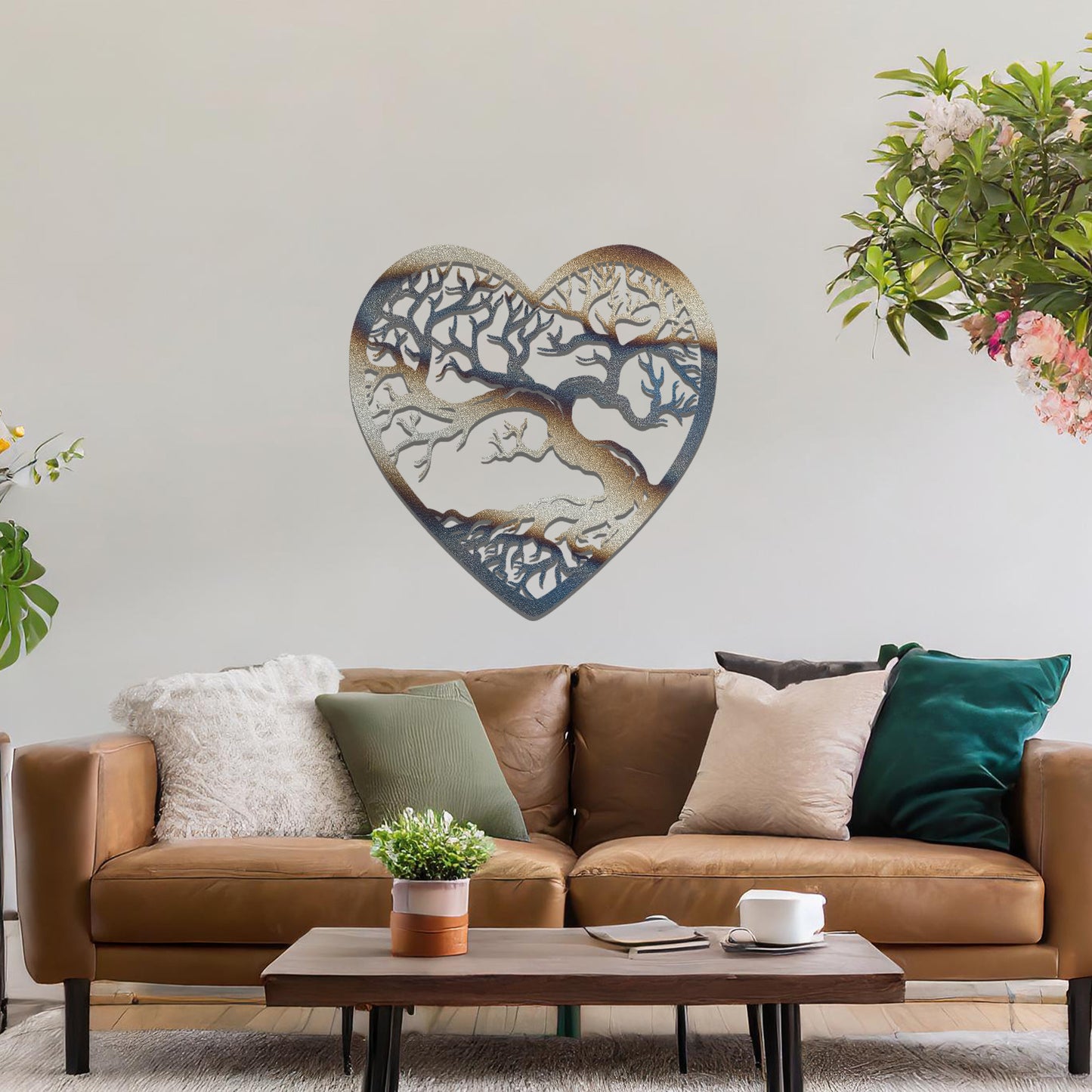 Metal wall art featuring a heart-shaped design with a detailed tree and intricate branching pattern, creating a striking and artistic focal point for the room.