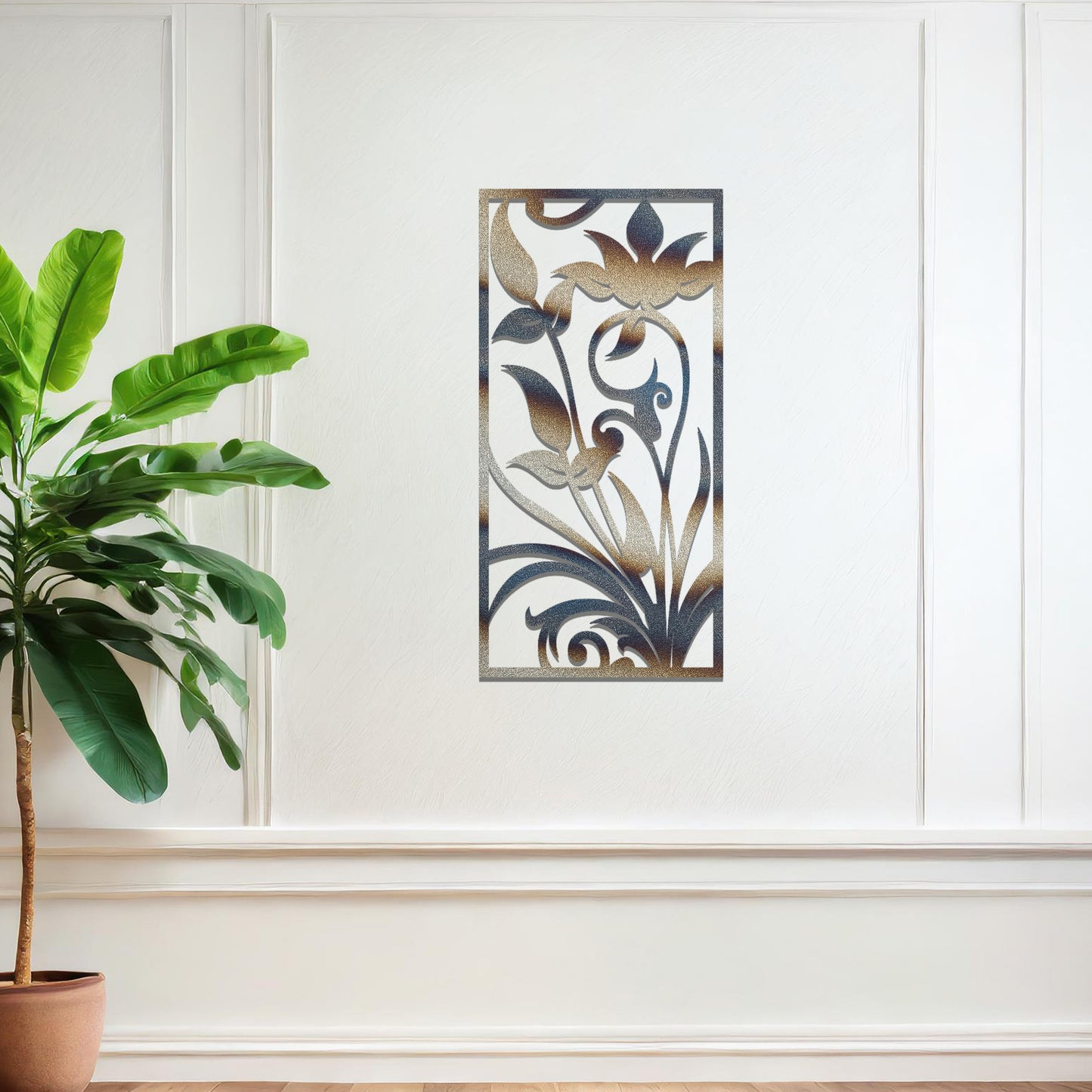 Metal wall art featuring a vertical design with elegant floral motifs and intricate swirling patterns, mounted on a neutral wall within sophisticated room decor. The delicate floral silhouette adds a refined and artistic touch to the space.