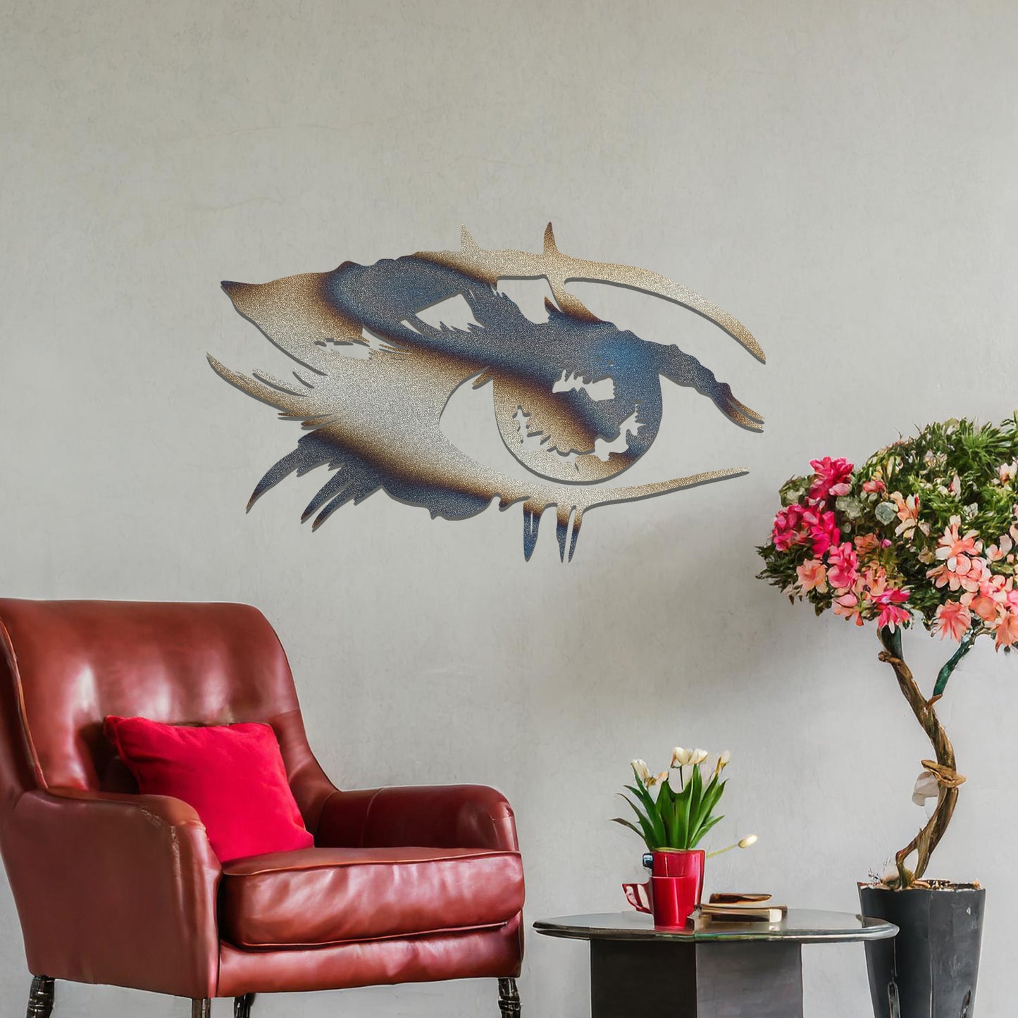 Striking metal wall art featuring a bold and artistic eye design with intricate detailing, mounted on a neutral wall within modern room decor. The focus is entirely on the creative and contemporary craftsmanship of the wall art, enhancing the space's aesthetic appeal.